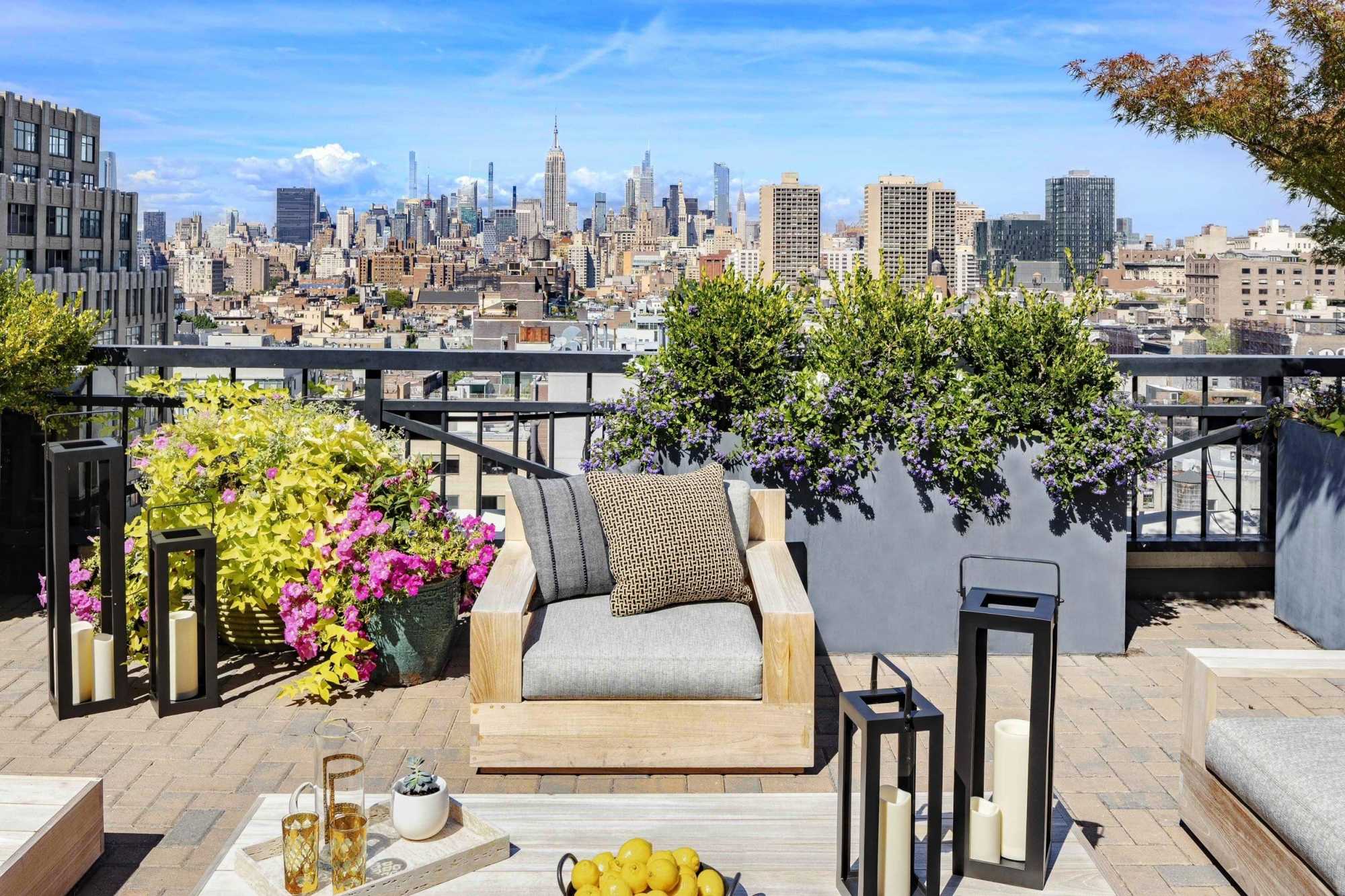 Lounger on a terrace with Manhattan skyline in the background