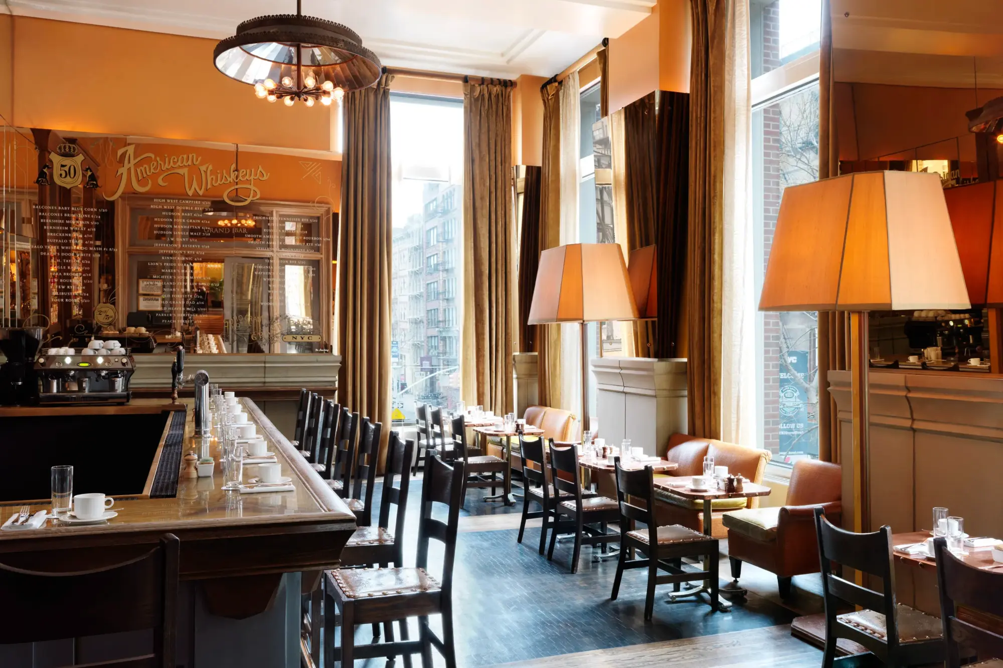 Modern saloon-esque whiskey bar with a mix of rustic and contemporary decor