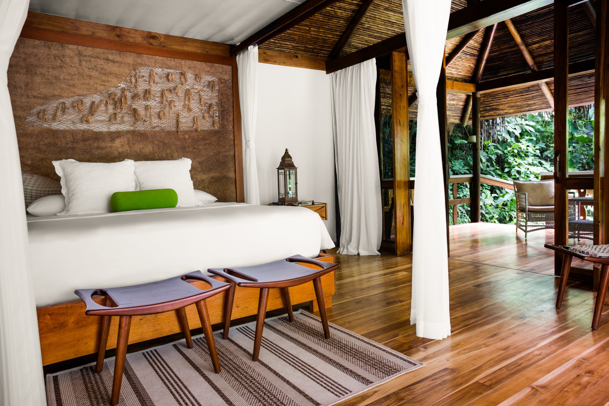 Hotel room with a view of lush jungle at Pacuare Lodge in Costa Rica