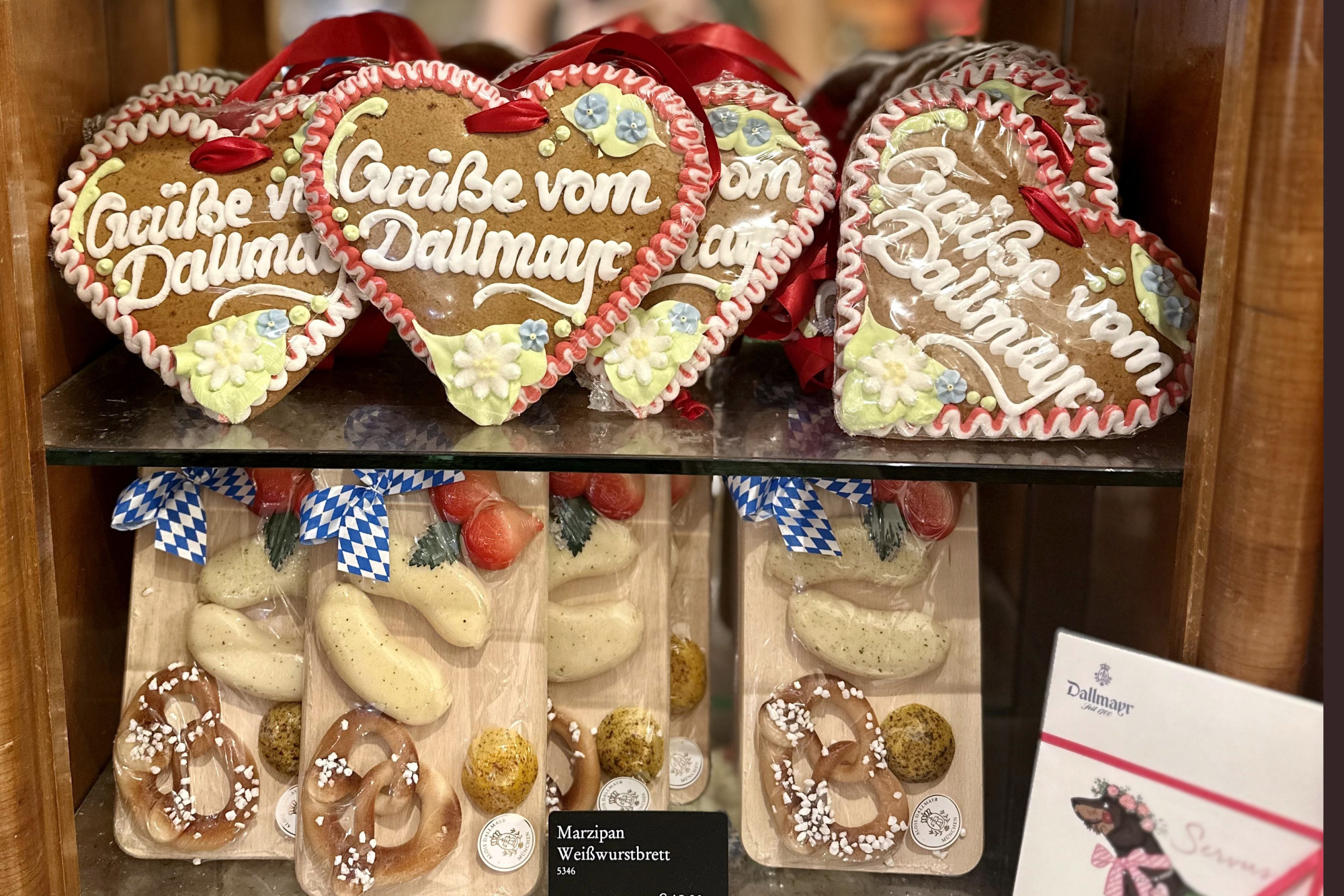 Packaged goodies line a shop window.