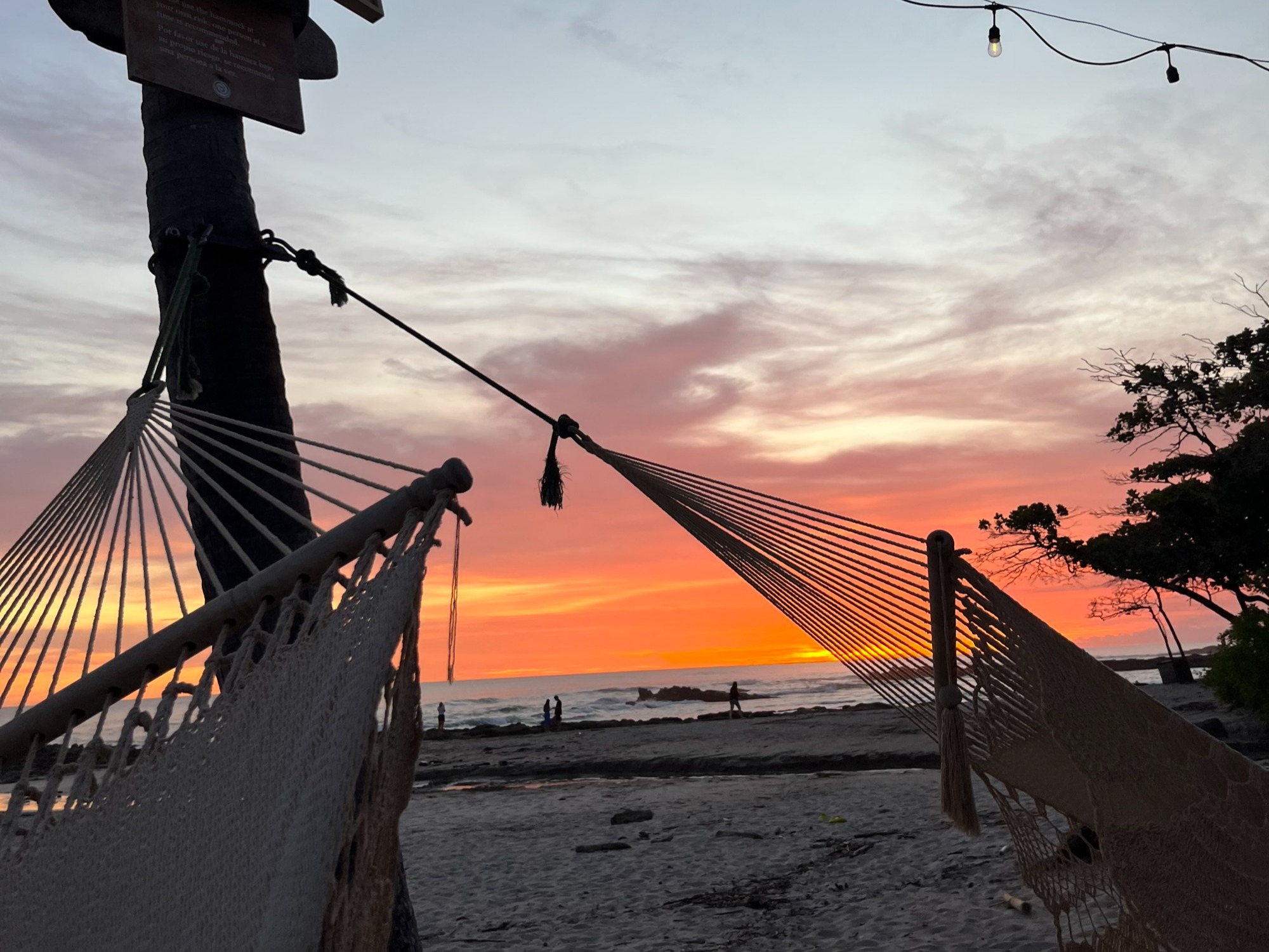 A view of the sunset from a hammock on the beach at Nantipa.