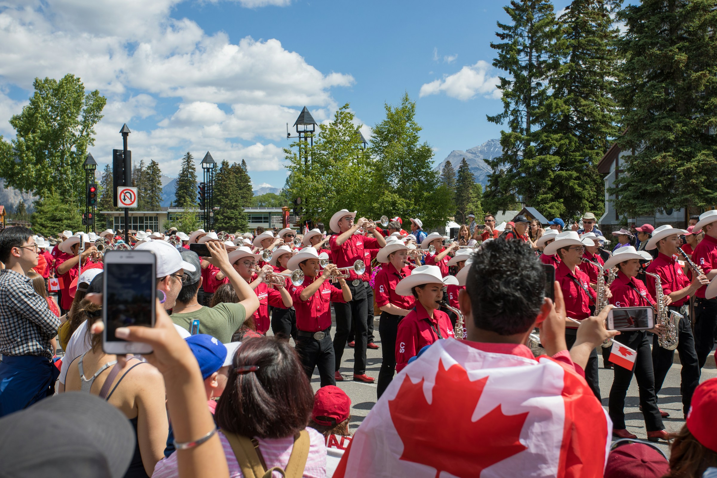 A band playing at the Calgary Stampede on a sunny day.