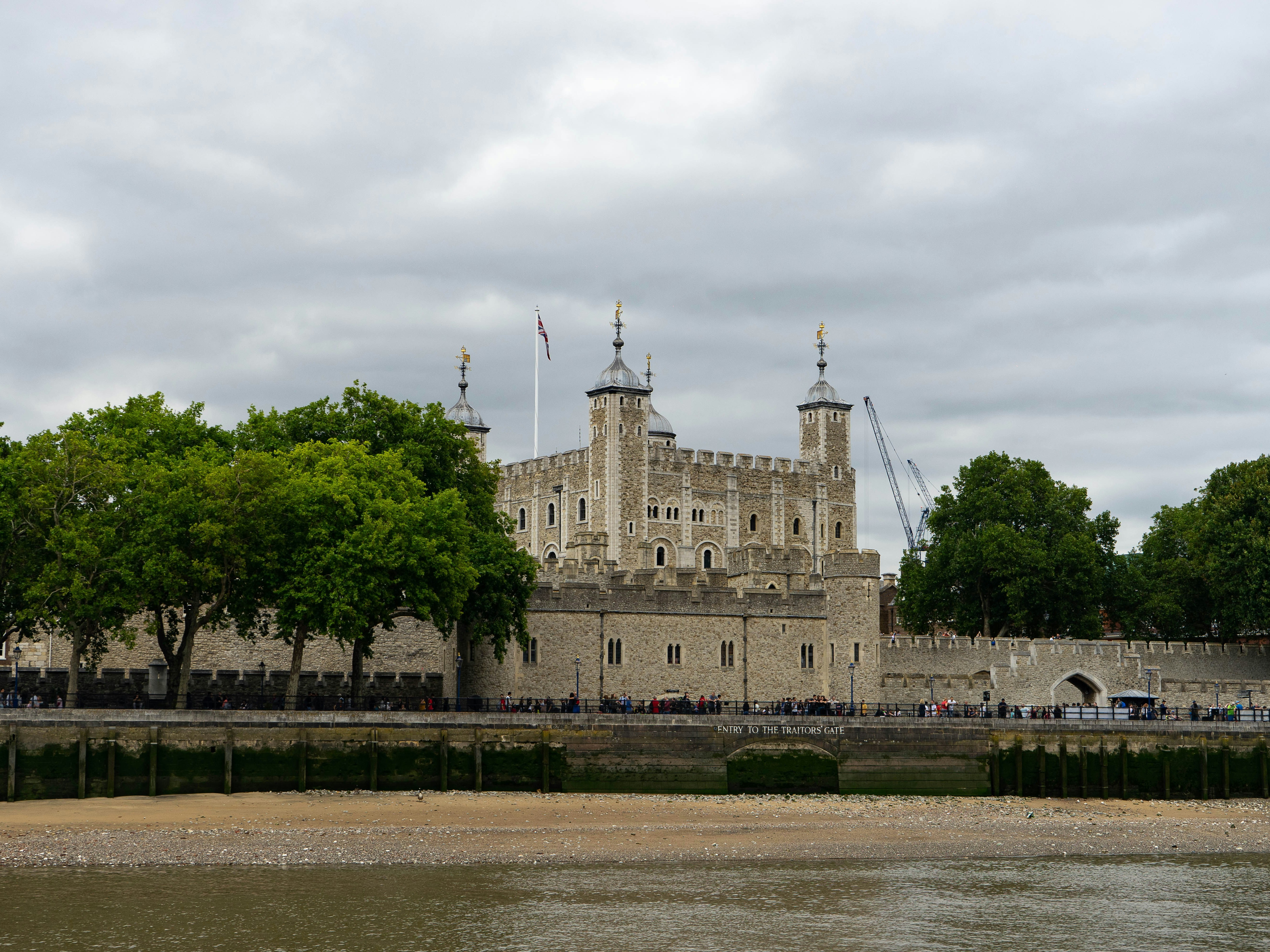 people-walking-near-brown-concrete-castle-london-travel-guide