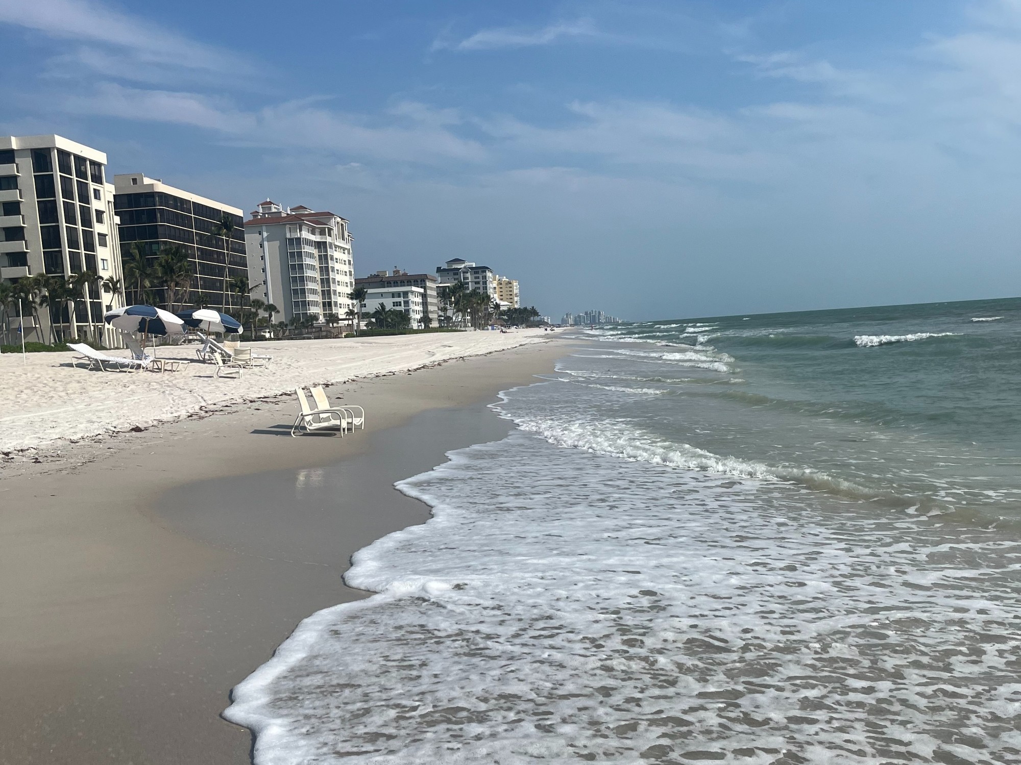 Beach with beach chairs.
