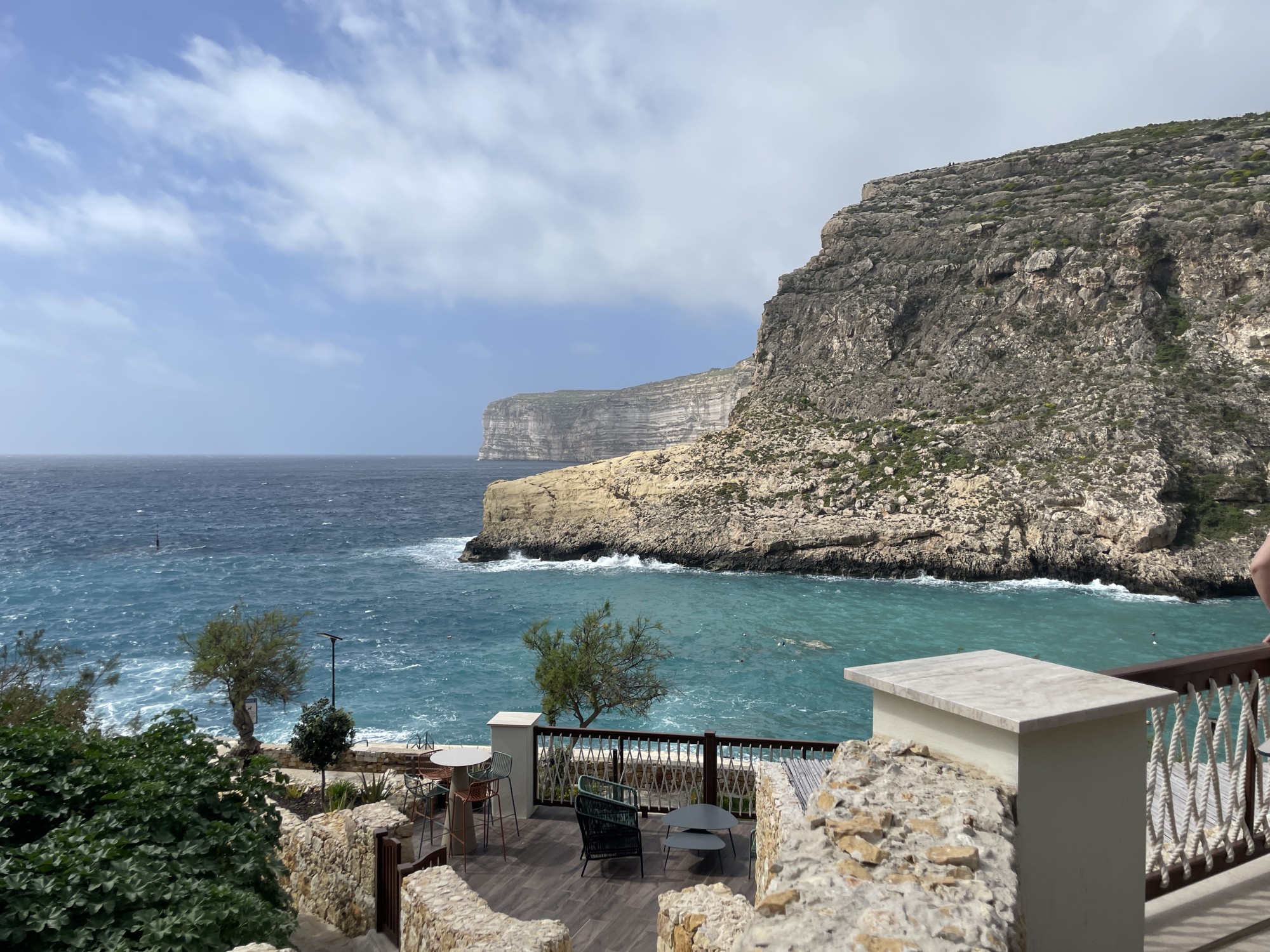 View of ocean from a resort's deck.