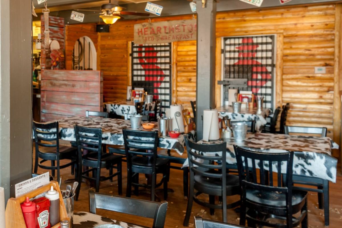 Old West-themed dining room with a patterned table cloth.