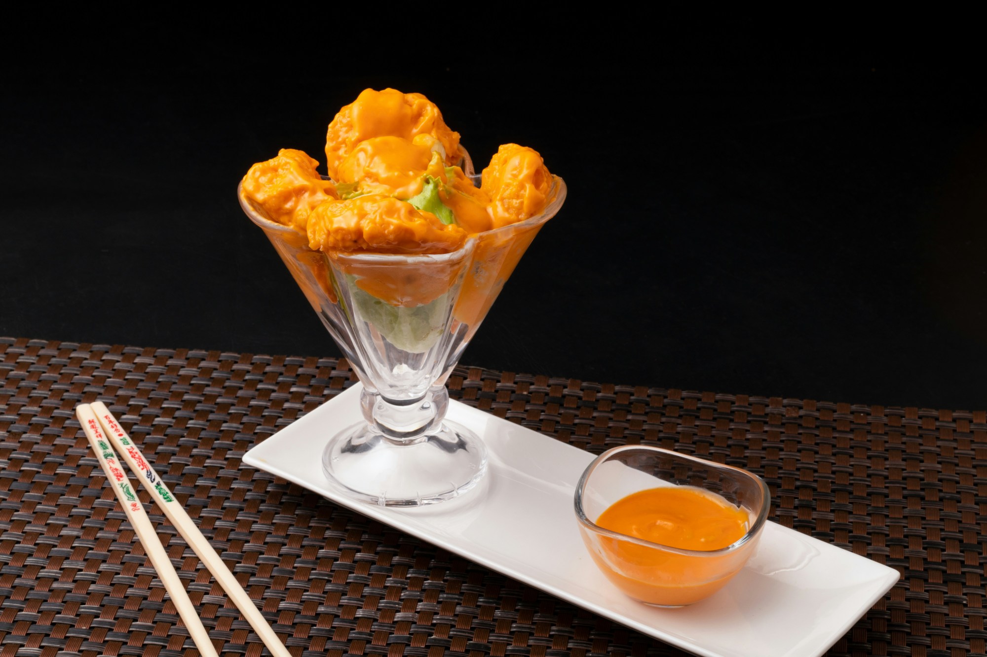 A view of food with sauce in a bowl.