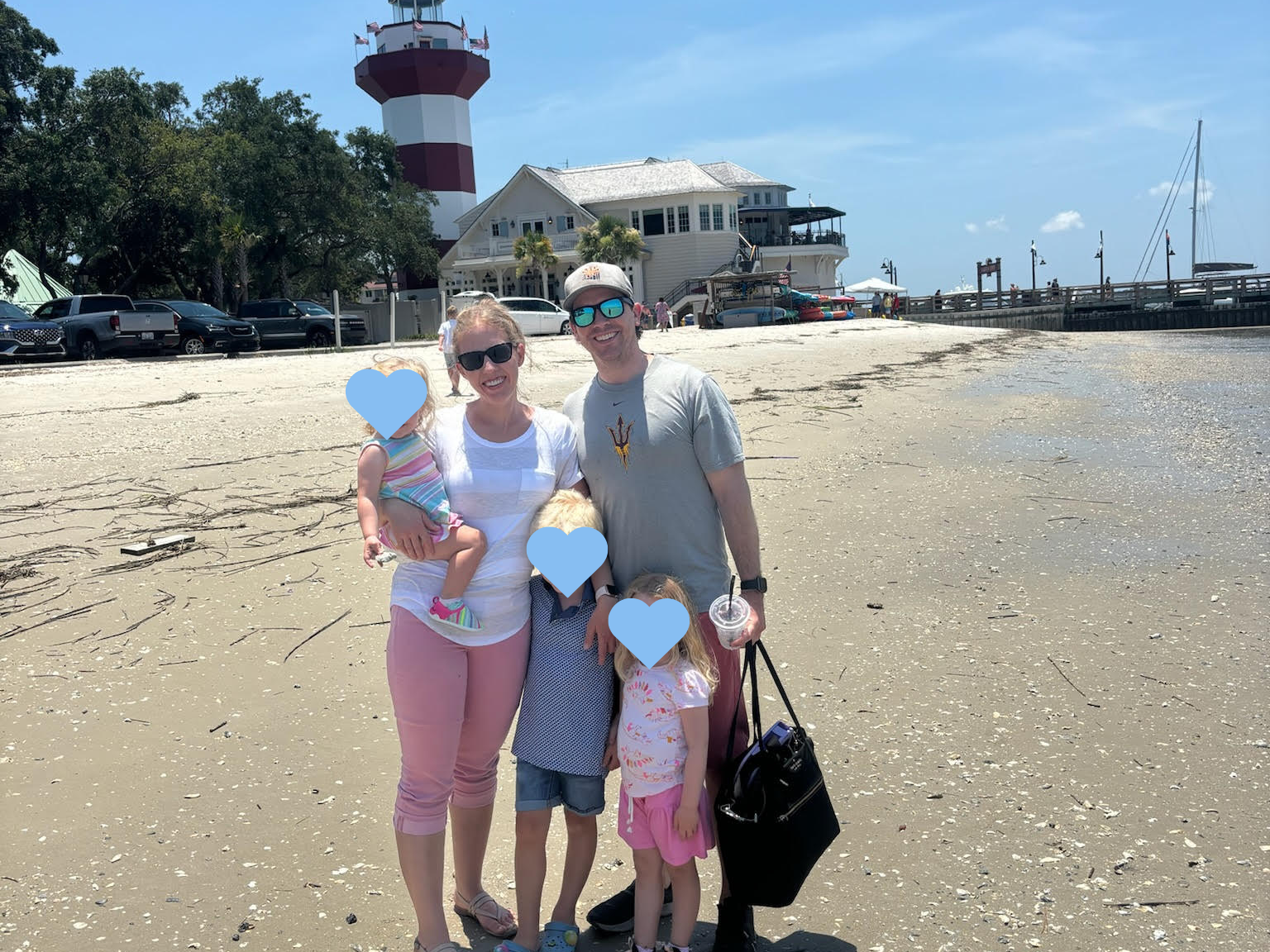 An image of a family at the beach on a sunny day.