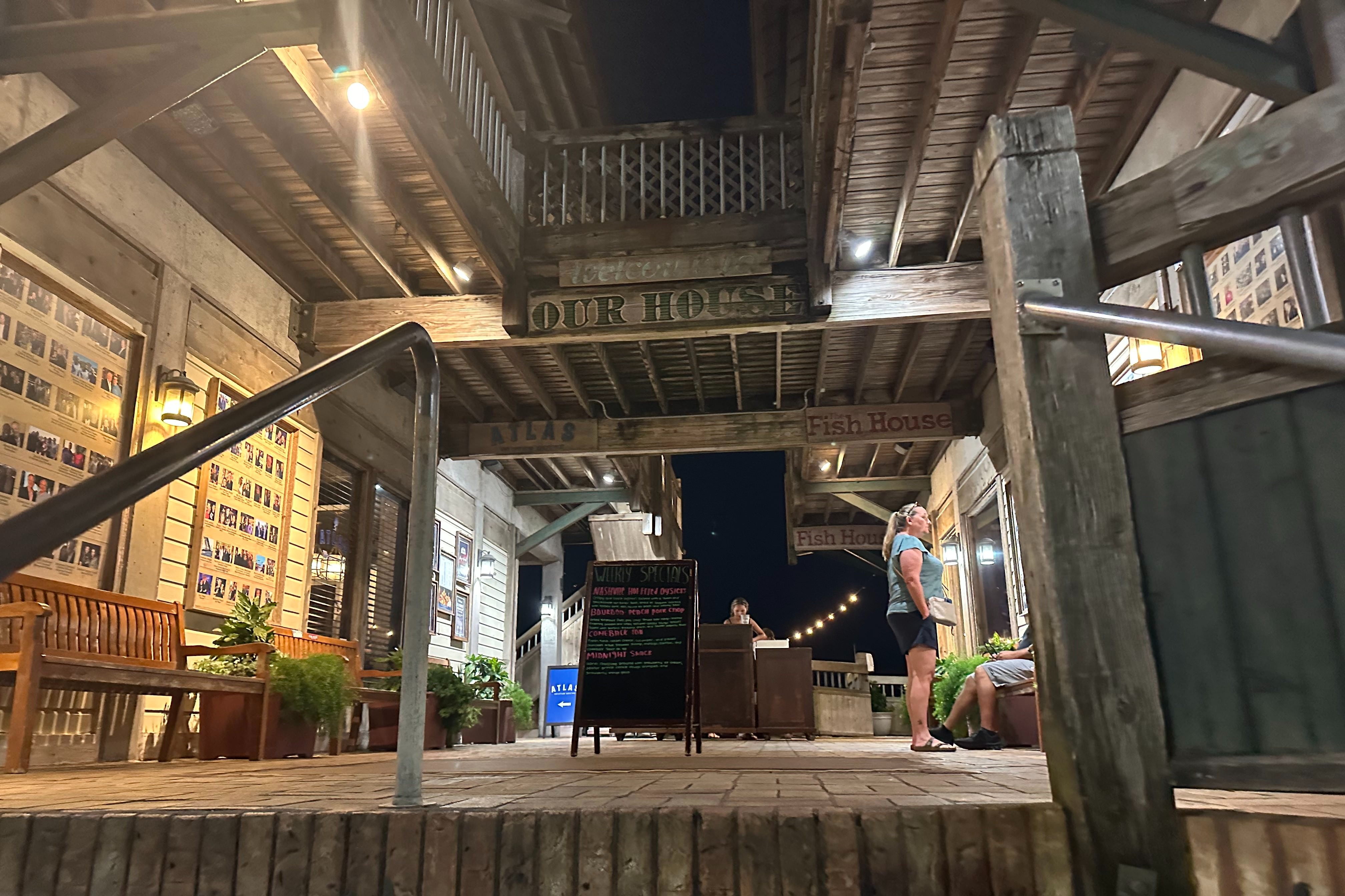 A wooden atrium area outside of the Fish House.