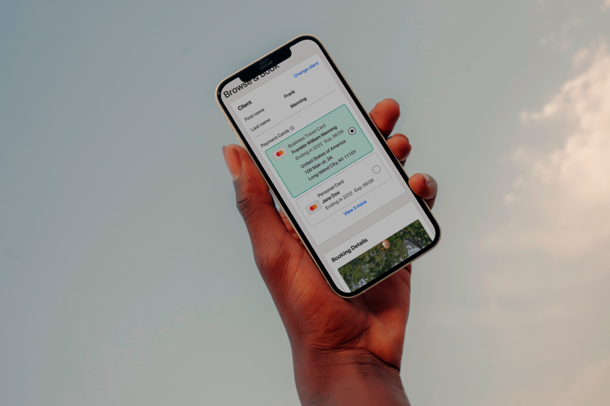 hand holding an iPhone in the sky