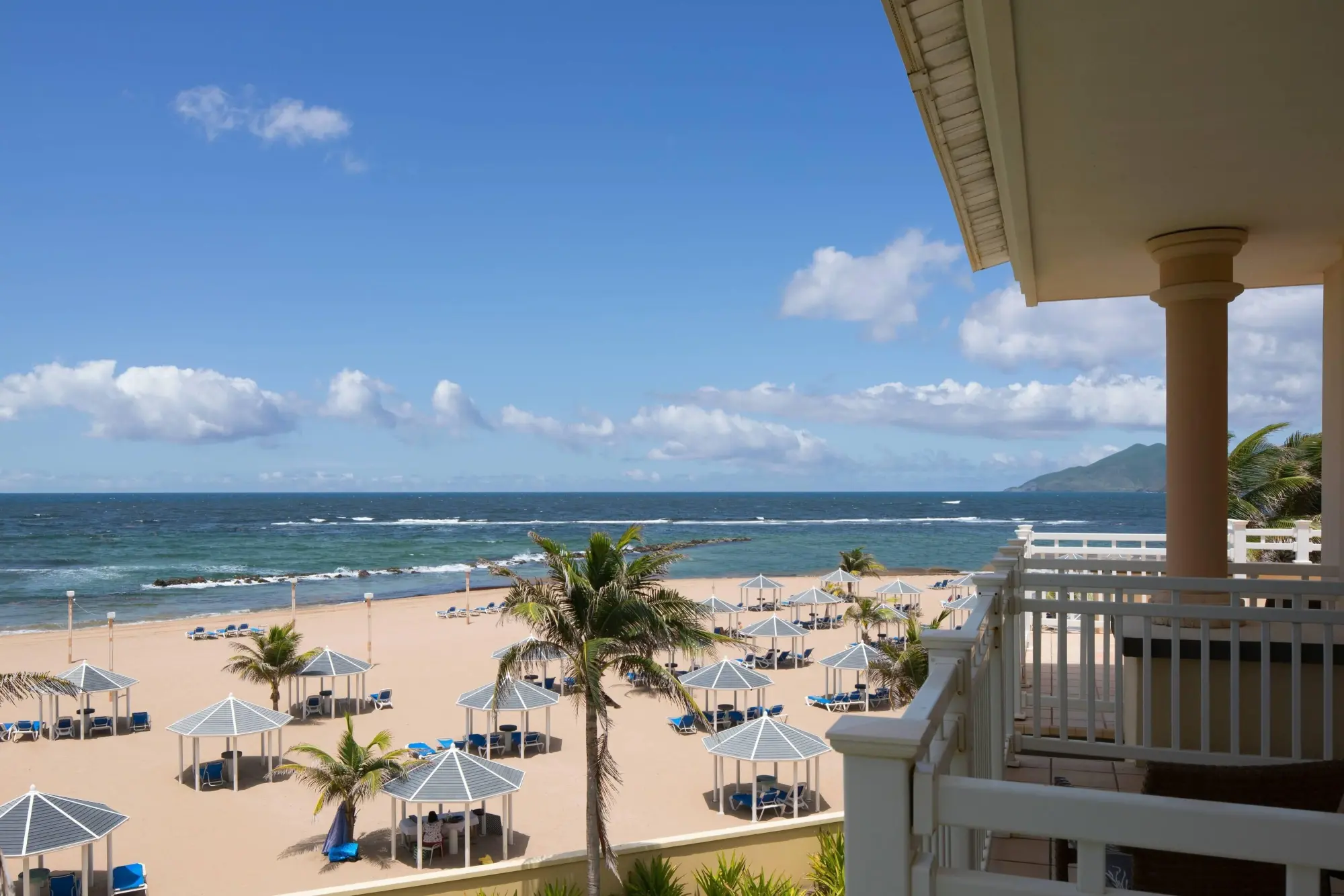 Dozens of gazebos fill an otherwise pristine Caribbean beach