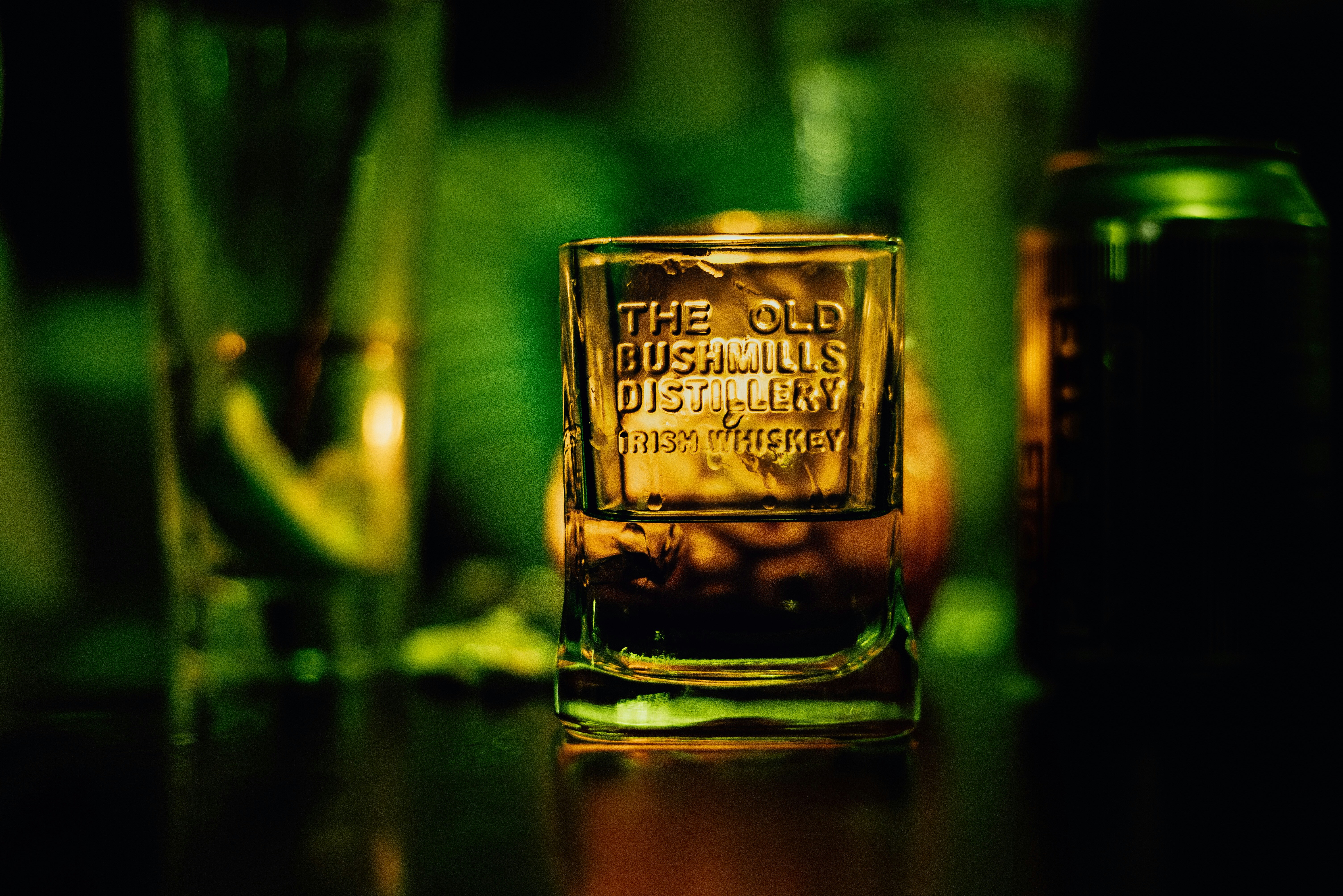 A glass filled with Irish Whiskey in The Old Bushmills Distillery.