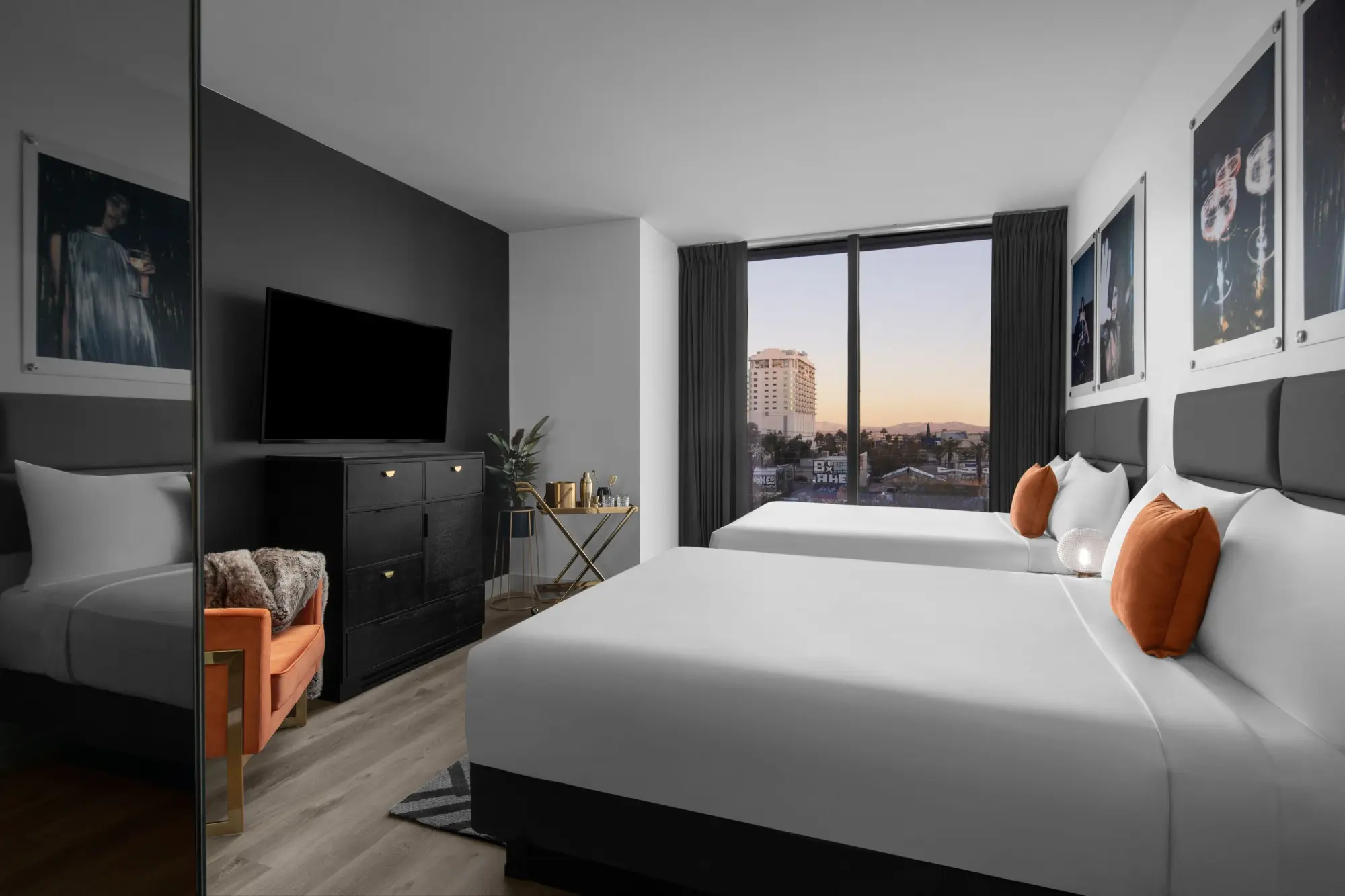 Chic decor and furniture fill a twin room at The ENGLiSH Hotel