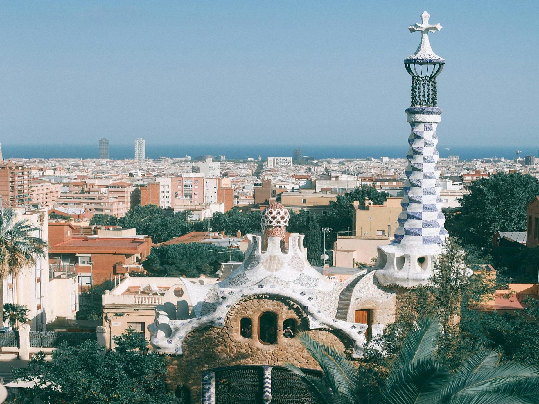 Unique architecture in a park with a view of the city in the background