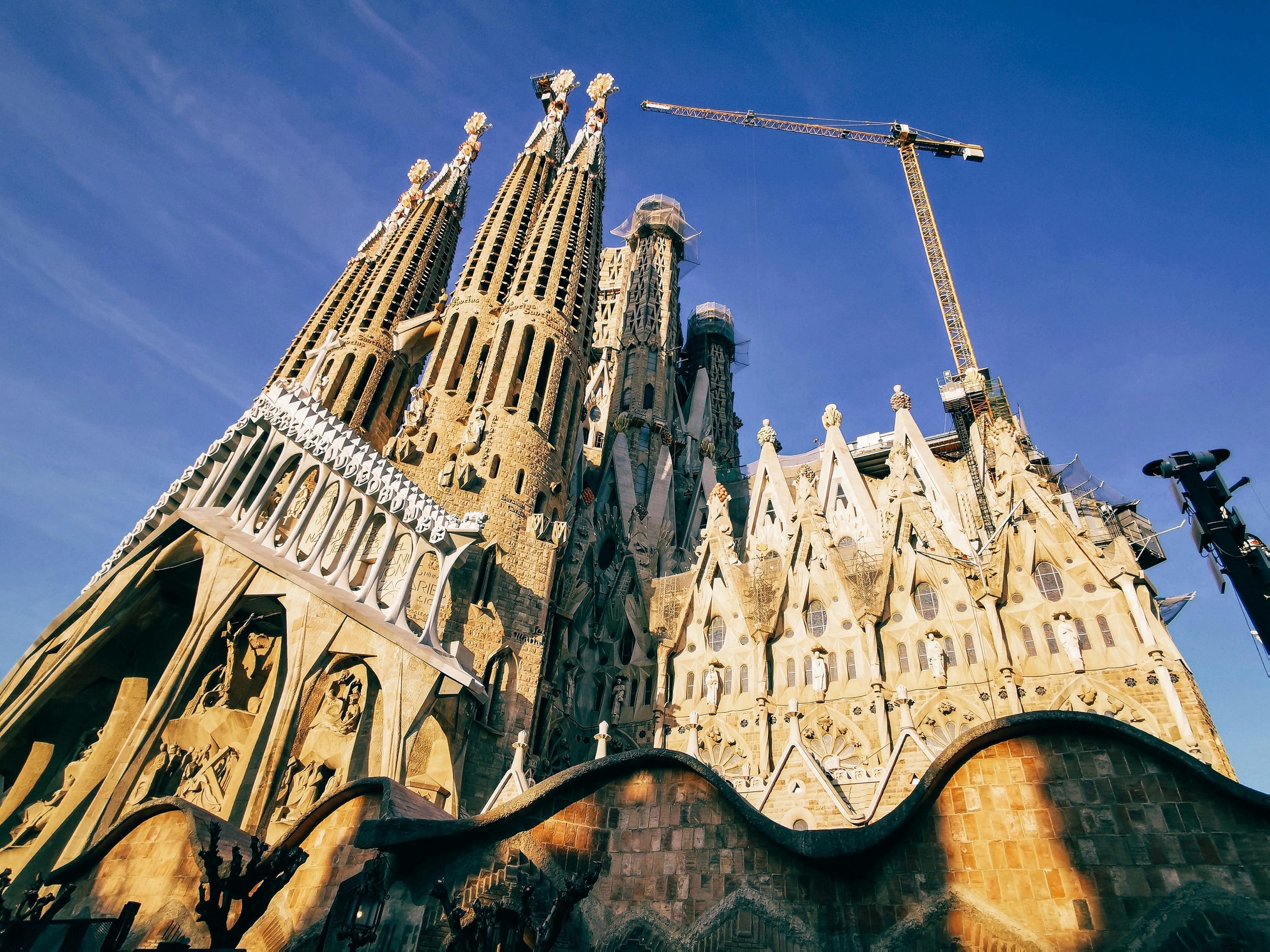 A low-angled view of a tall cathedral during the daytime