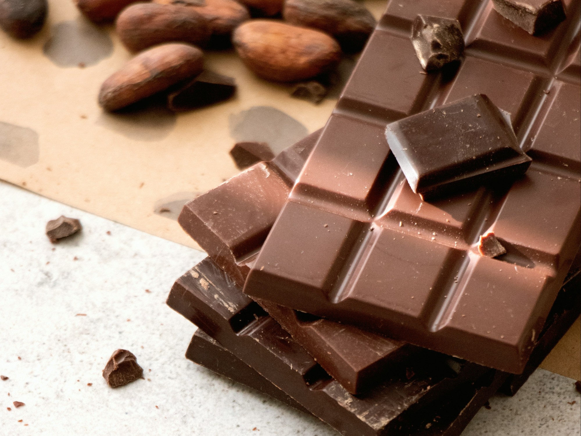 Chocolate bar on white table.