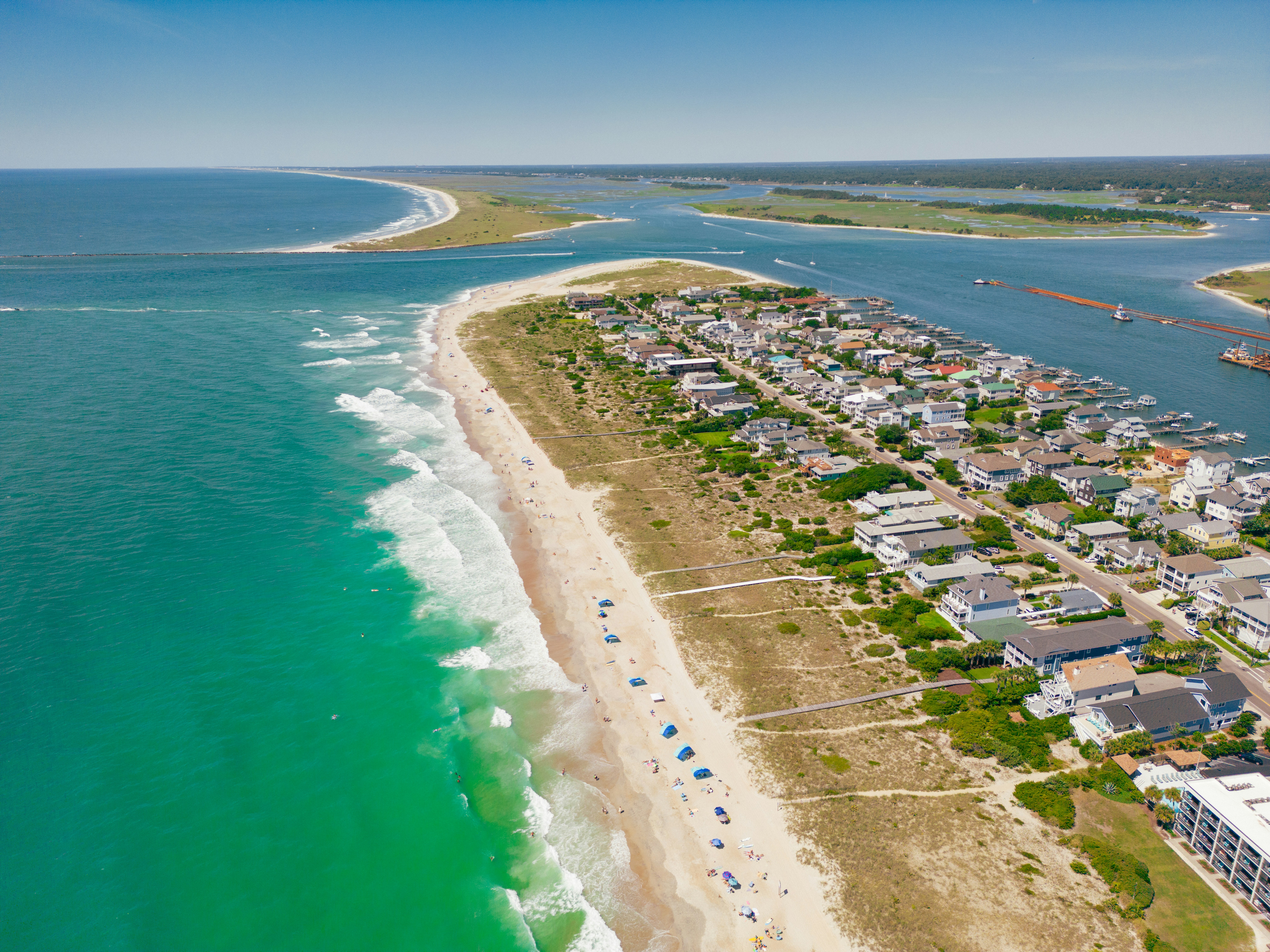 Aerial view of Wilmington Beach and city on a narrow stretch of land surrounded by ocean