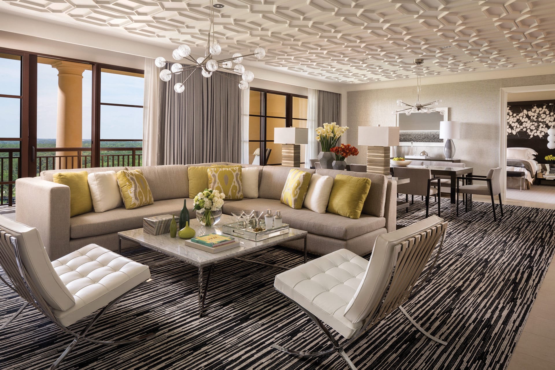 A swanky suite filled with luxurious decor and furnishings as well as plenty of space and great views of the resort grounds