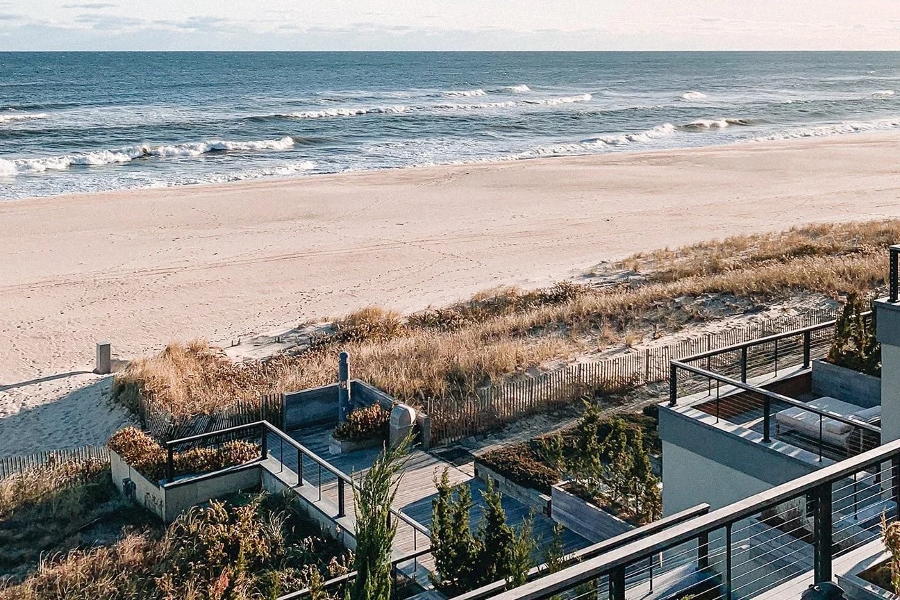 weathered wooden terraces overlook the beach