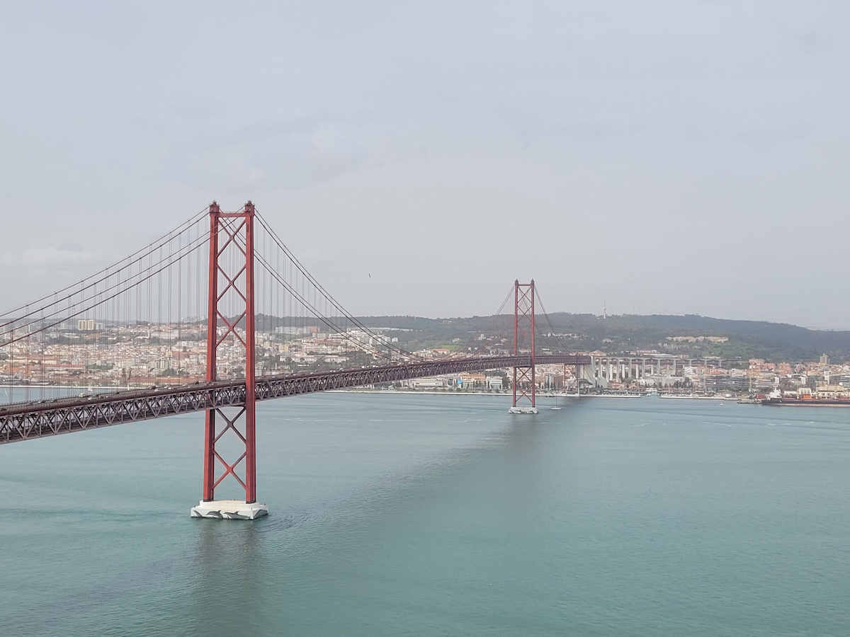 View Of Ponte 25 De Abril Bridge From Sanctuary Of Christ The King.