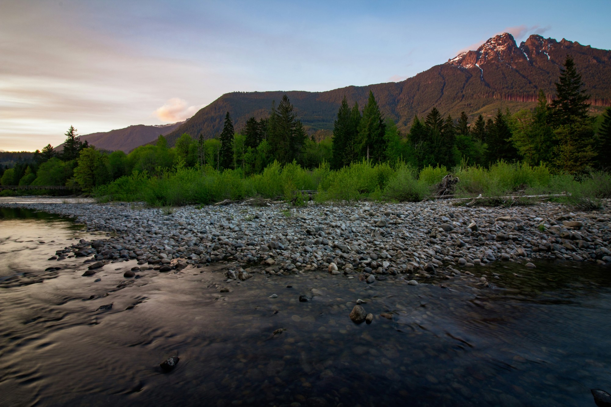 River with mountains at back.