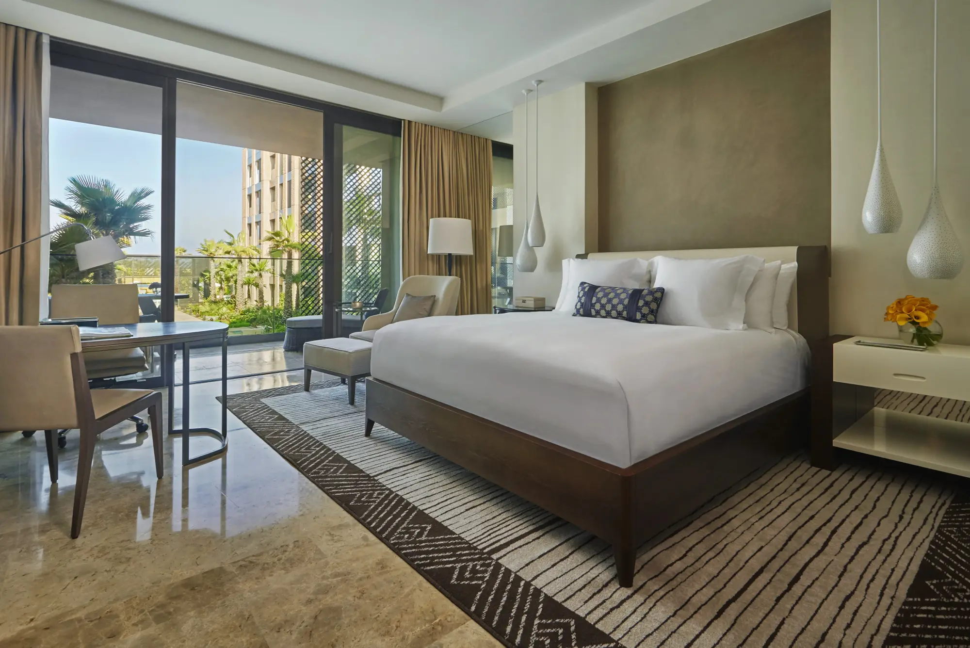 A spacious suite with garden views and Moroccan design touches