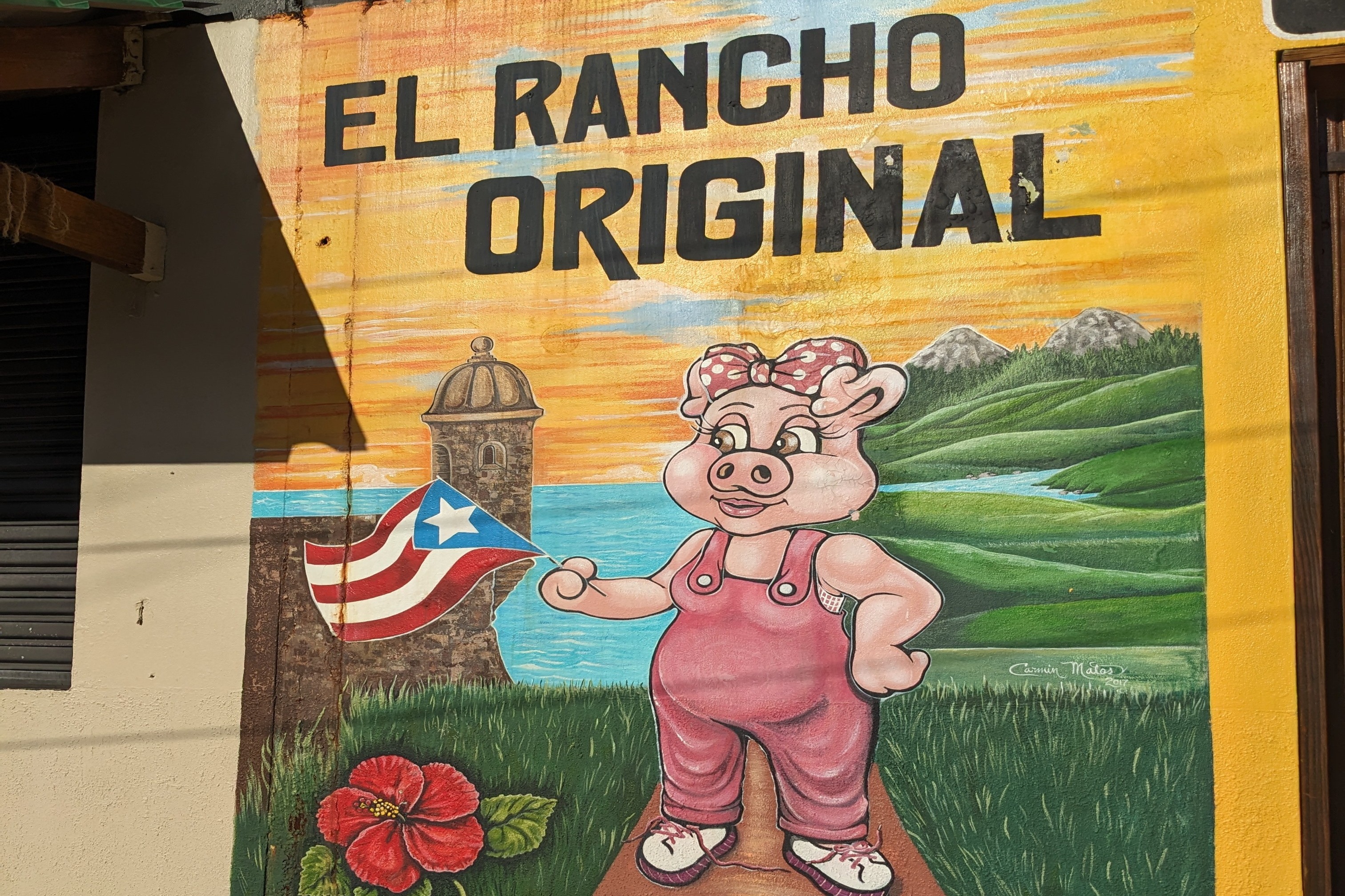 A picture of a colorful poster of a restaurant.