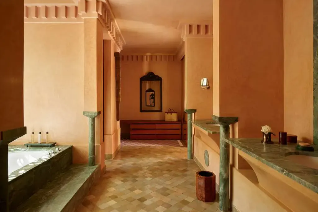 Jade counters and fittings, a deep spa tun, Moroccan tiles and more local influences fill a spa room at Amanjena
