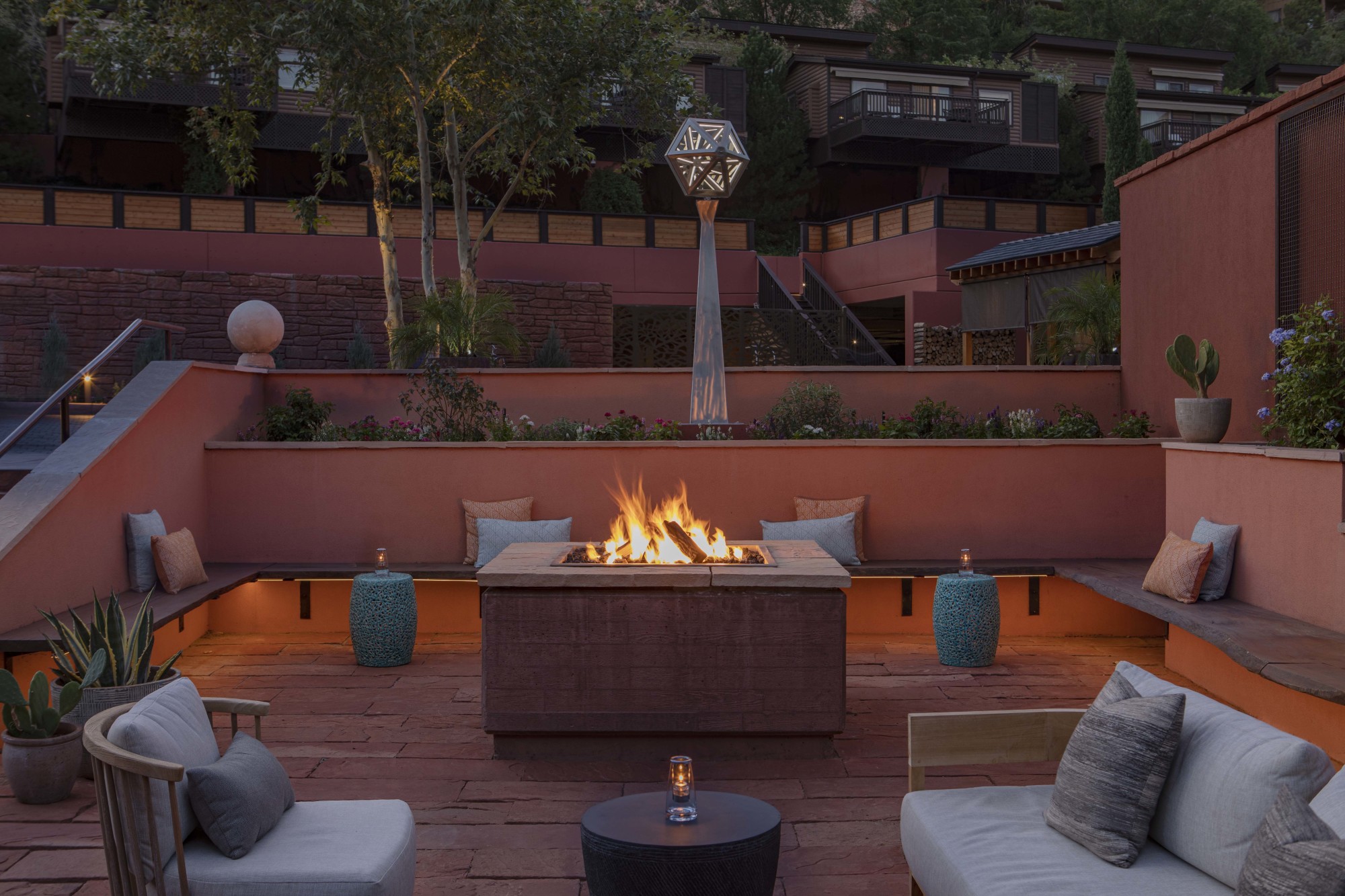 An outdoor seating area with a fire place