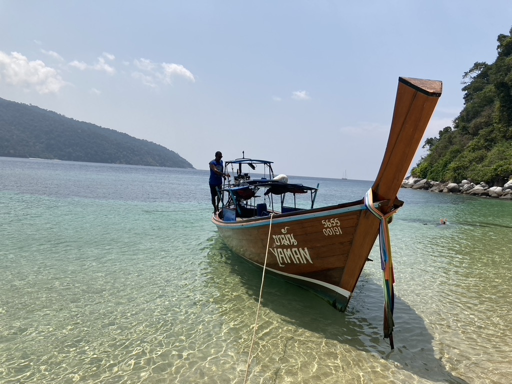 A boat in the water for your snorkeling tour.