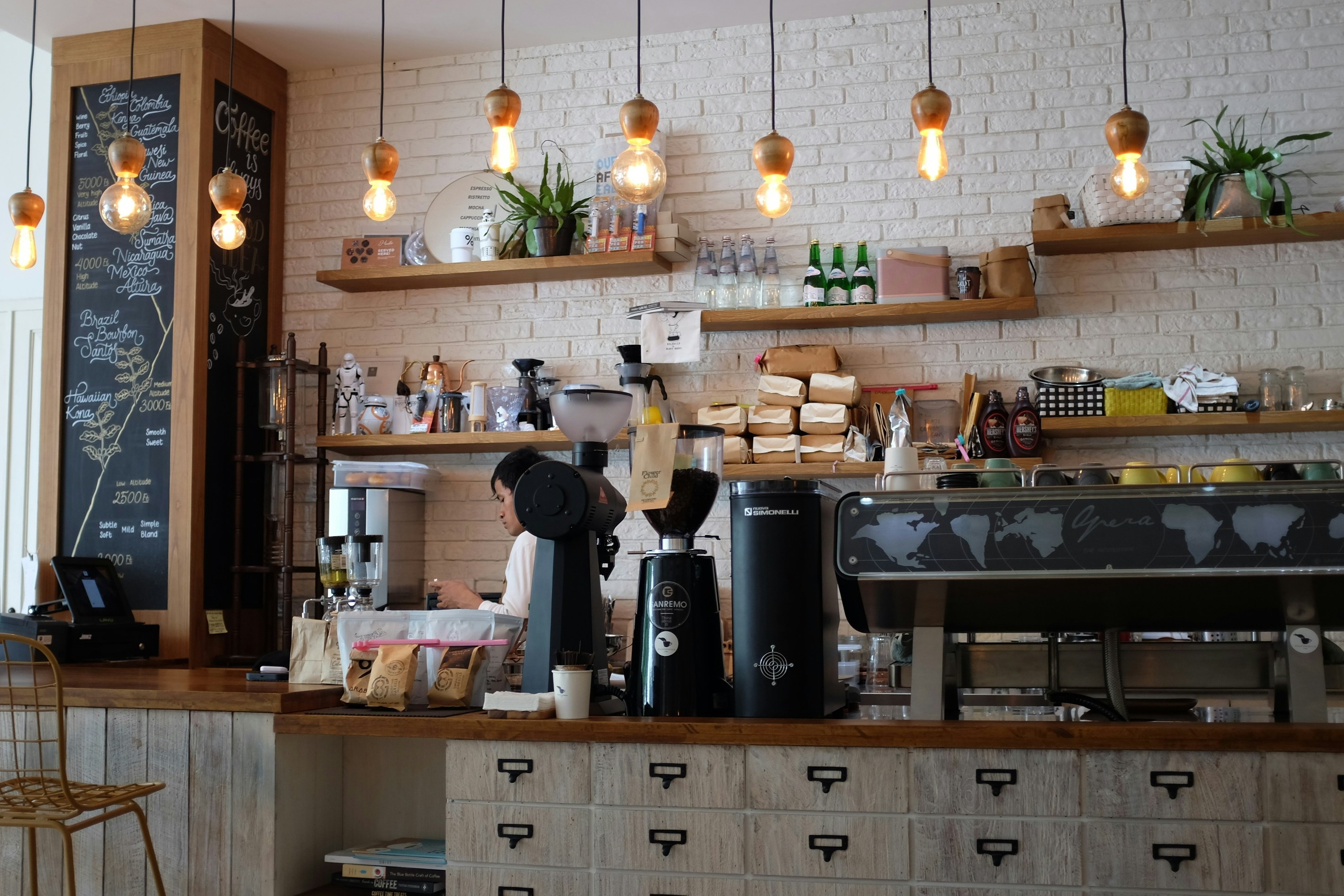 A picture of the interior of a cafe during the daytime.