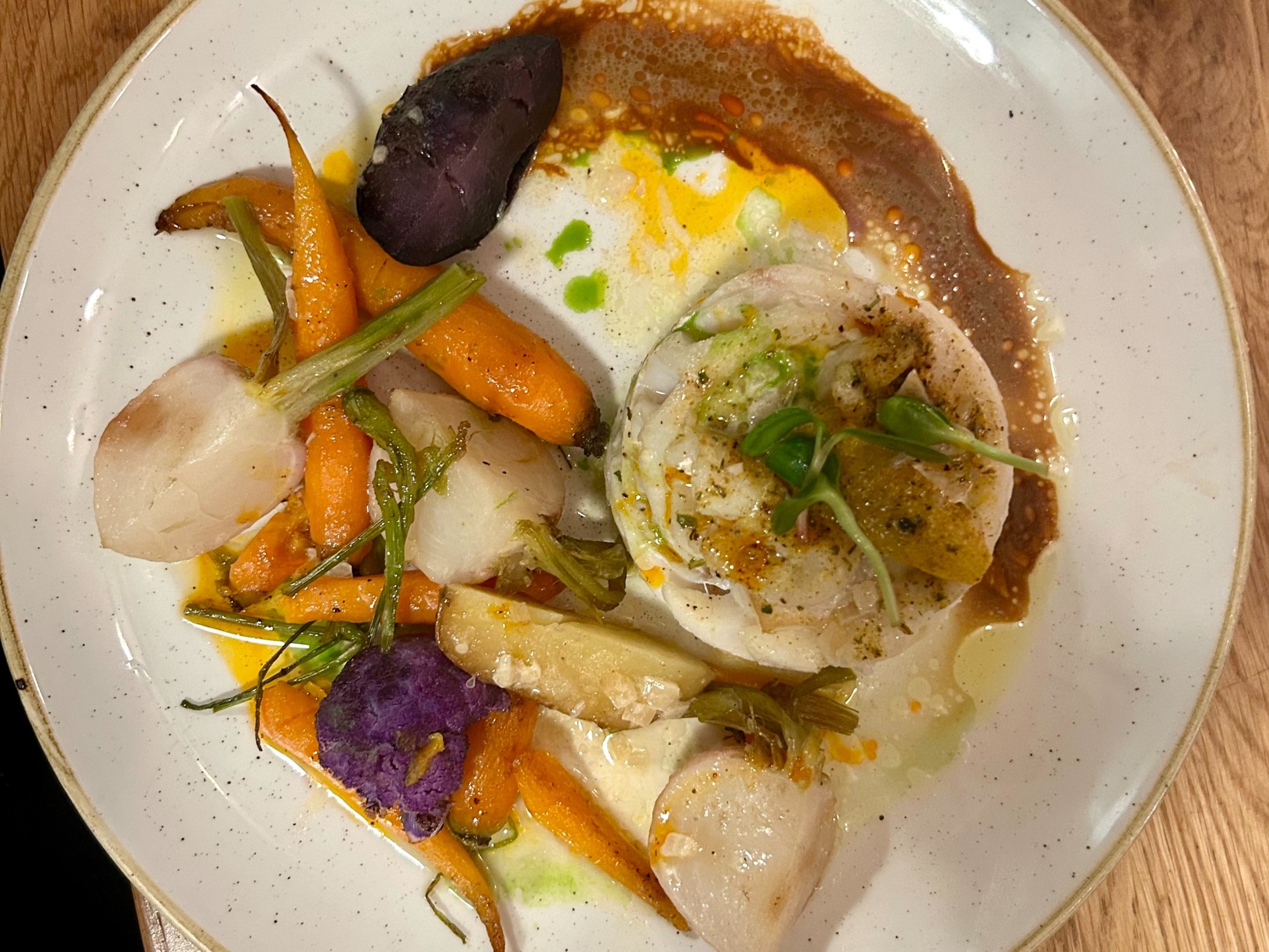 Vegetables on a white plate at a restaurant in the 6th arrondissement of Paris.