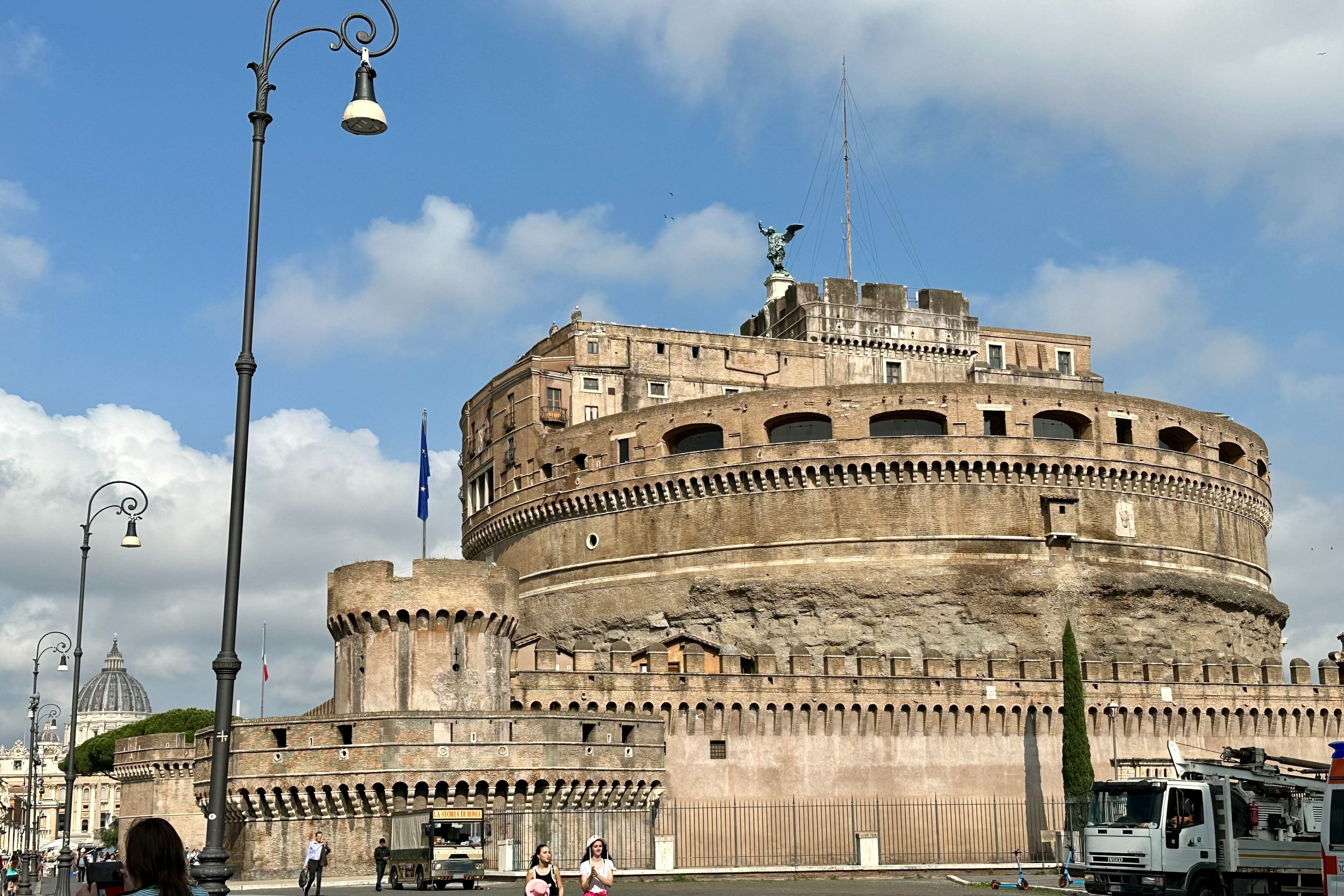 A round concrete castle-style building called Castel Sant'Angelo during the daytime.