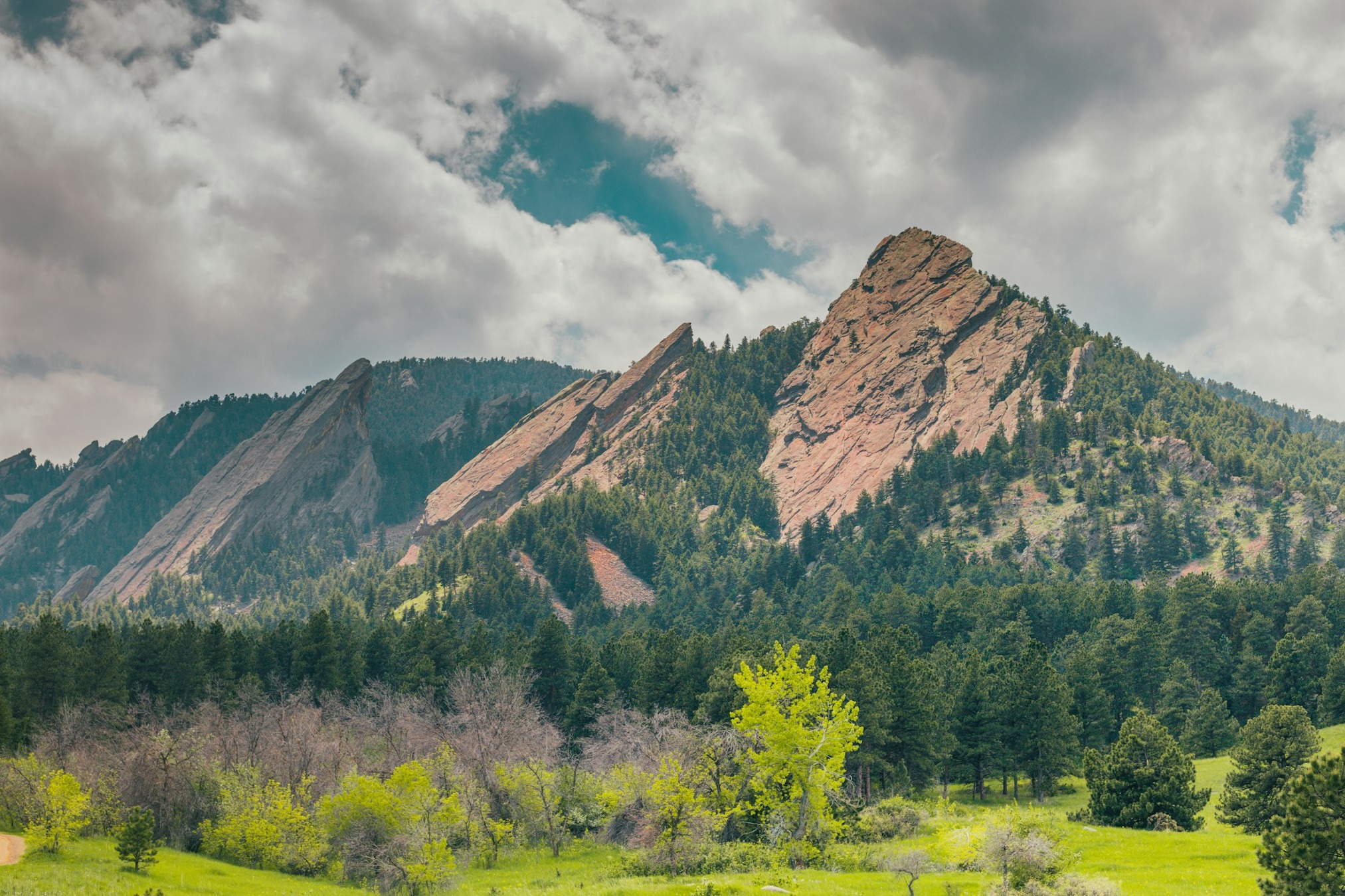 view of a mountain range on a cloudy day