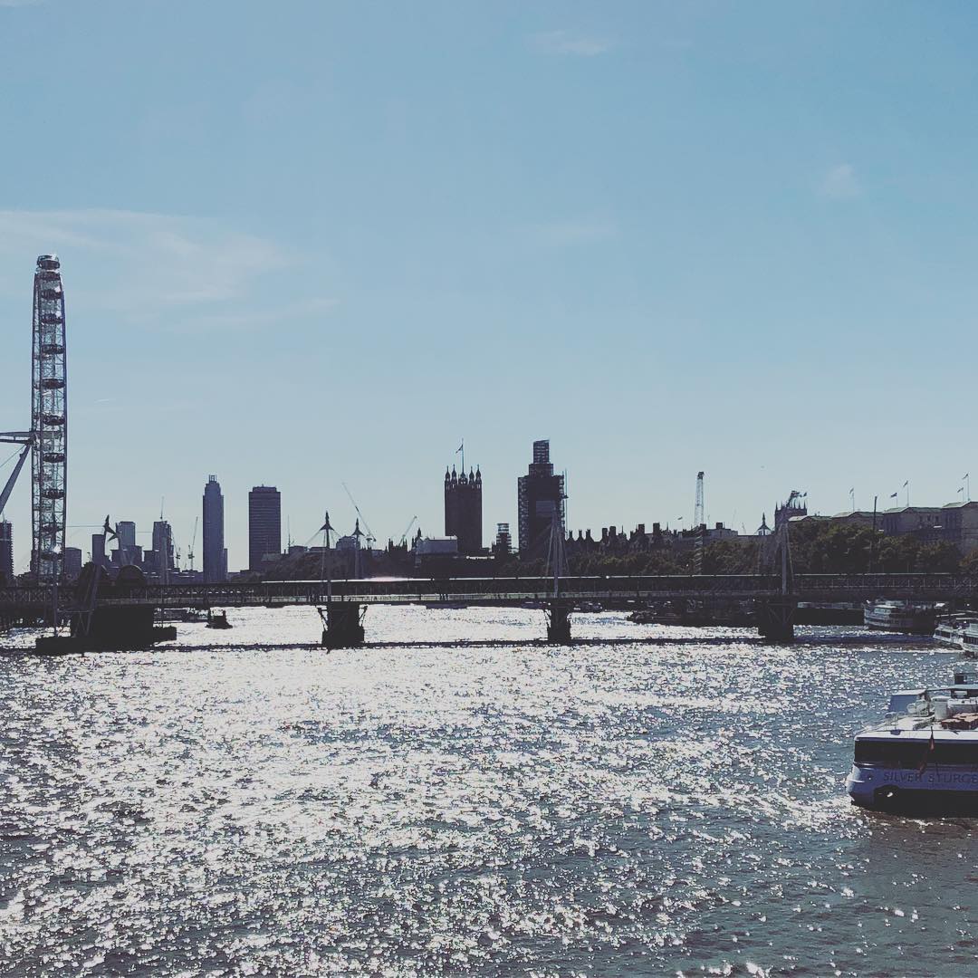 View of a bridge in London with tall buildings in view