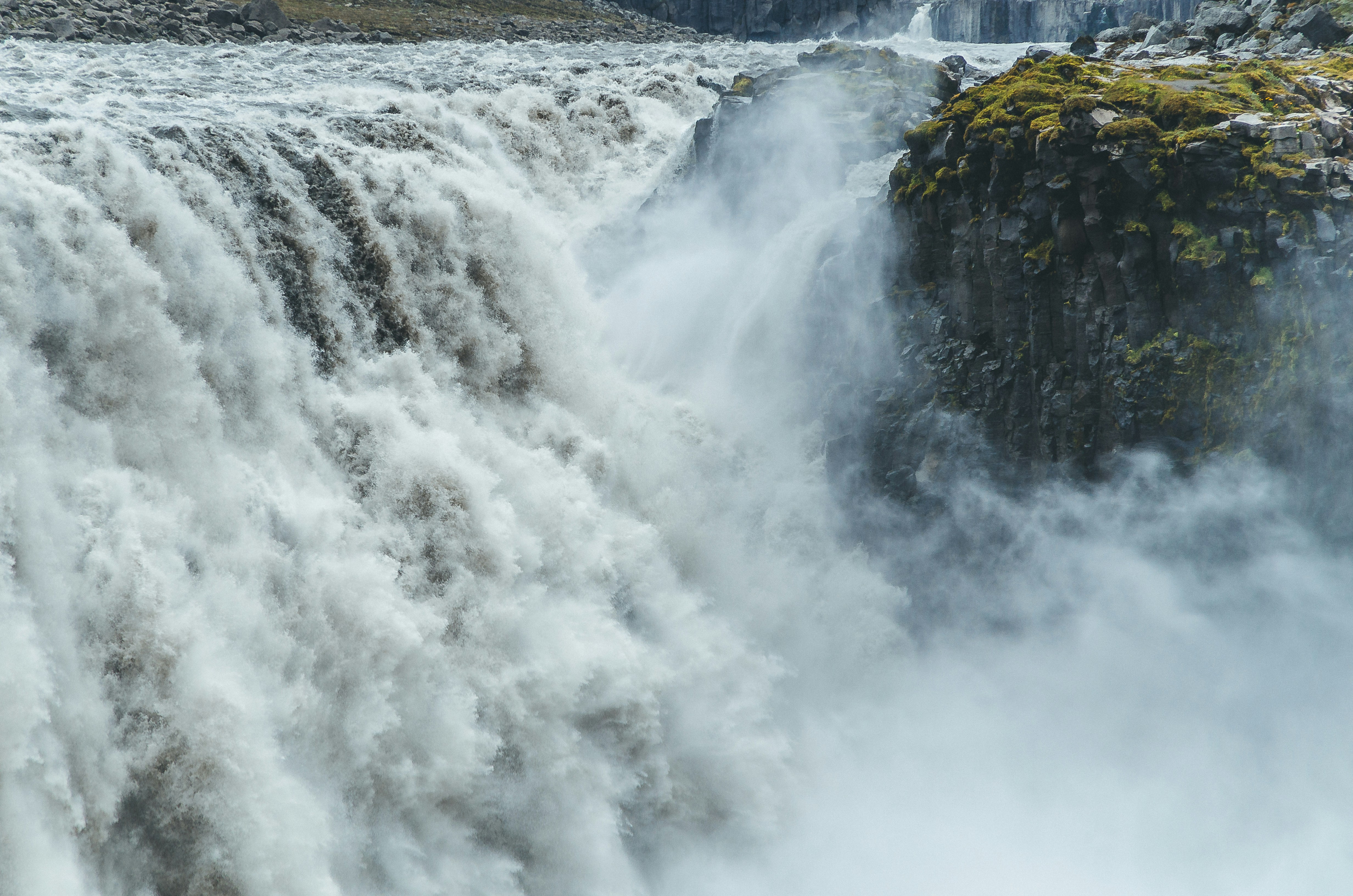 A panoramic photo of waterfalls during daytime.