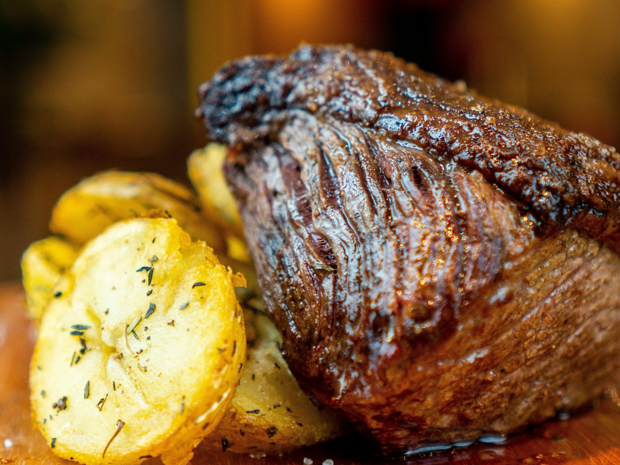 A juicy steak and seasoned potatoes.