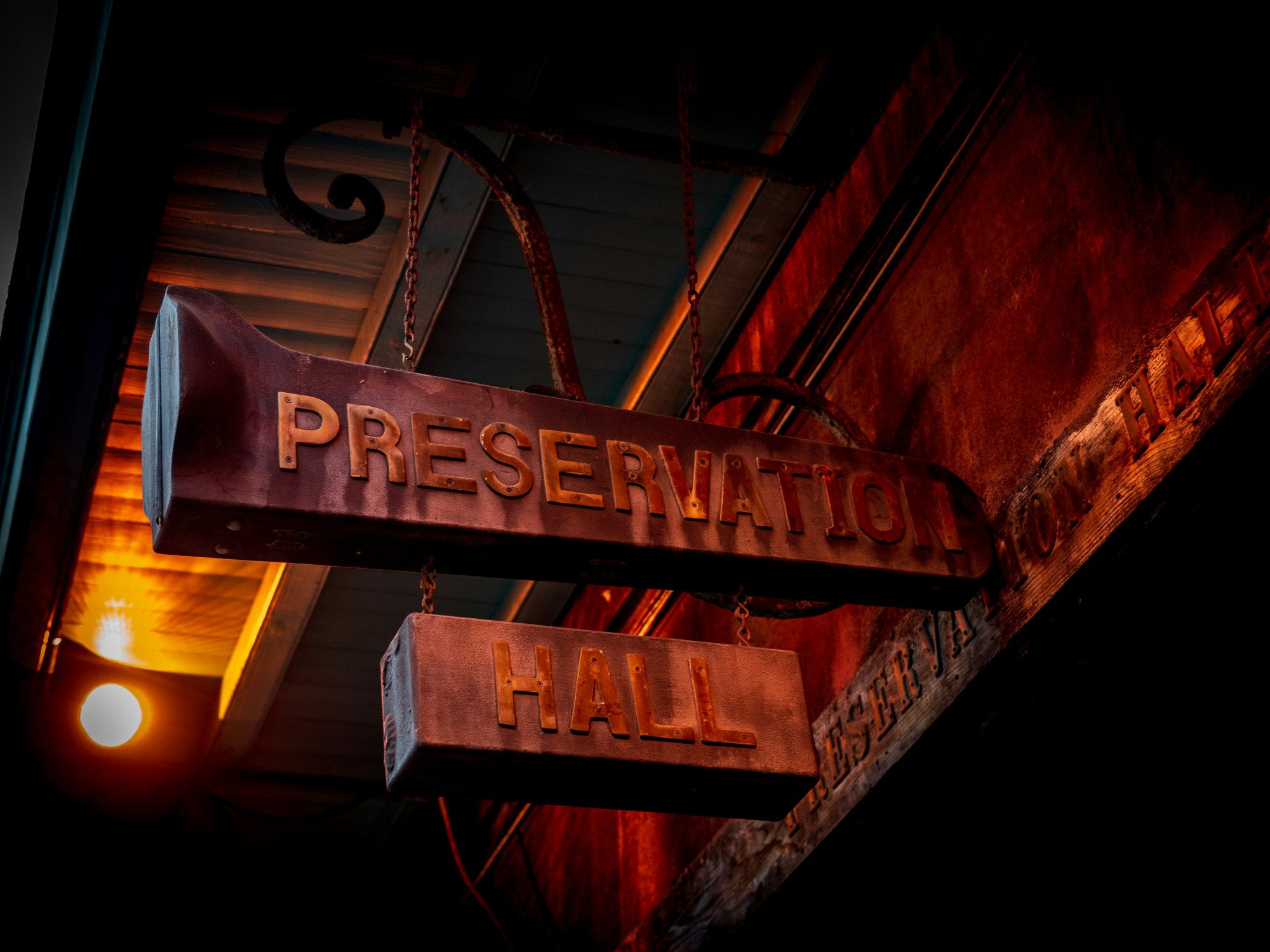 Preservation Hall signage board in rustic brown color.
