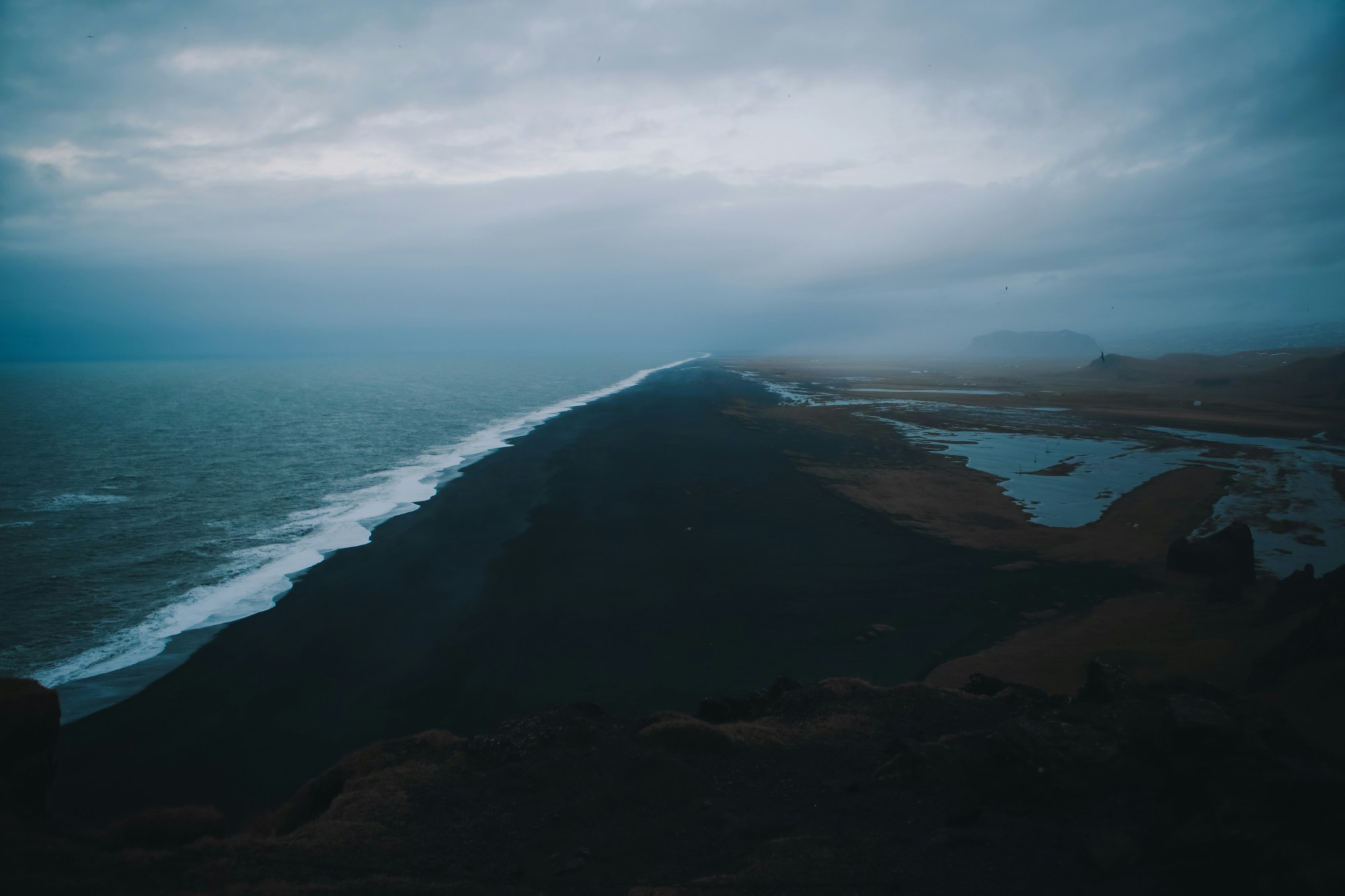 Beach with black sand.