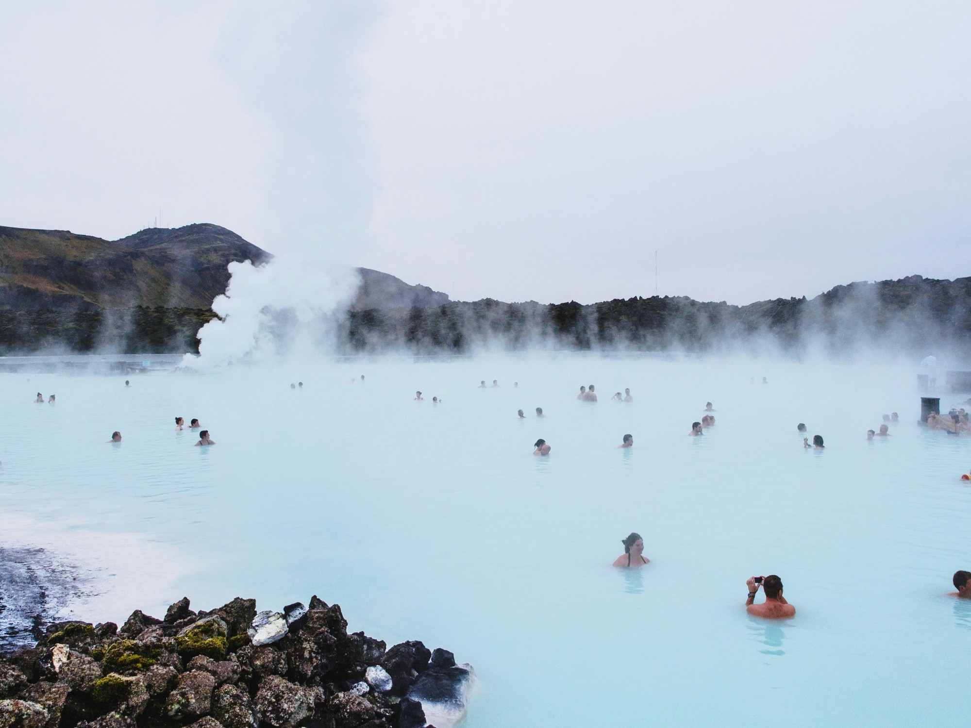 People swimming in a lake.