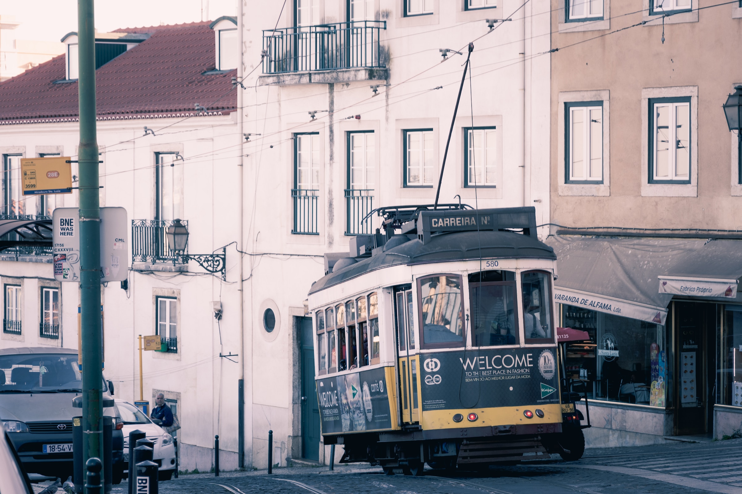 Tram on the street of Alfama, the oldest neighborhood in Lisbon.