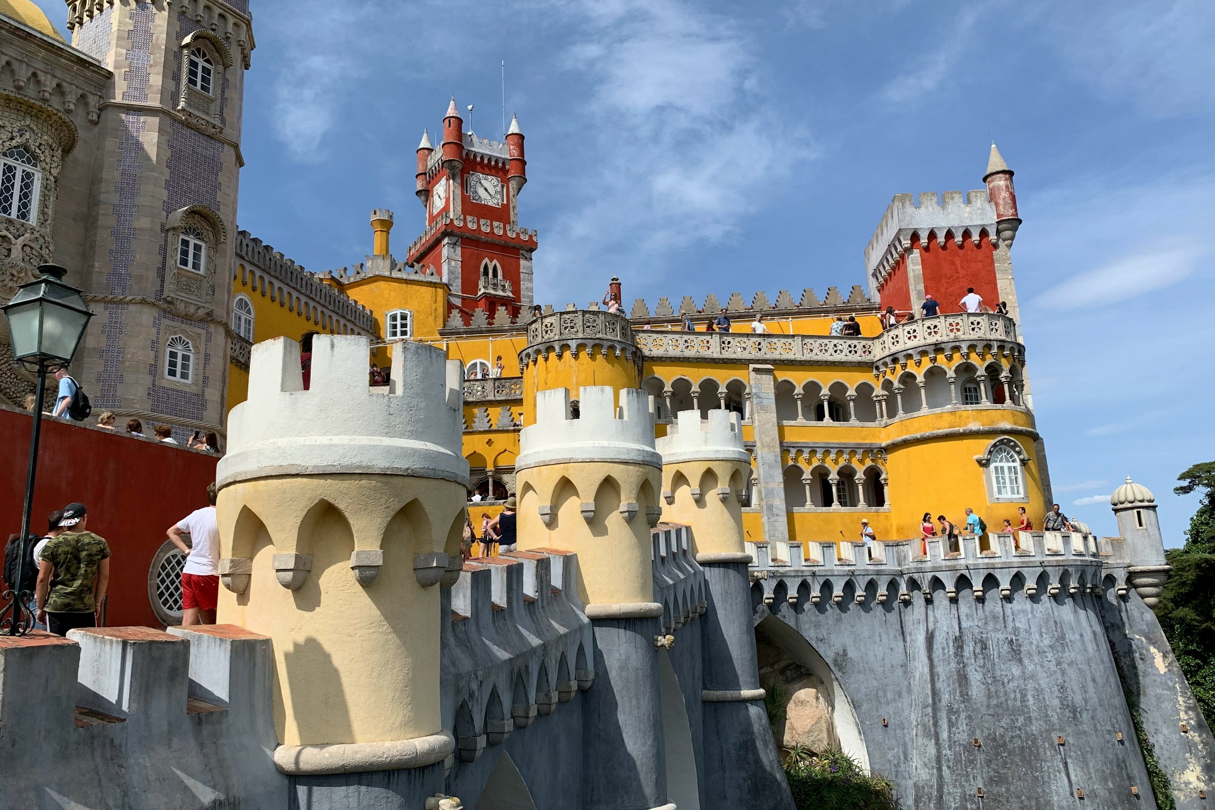 A red and yellow castle during daytime