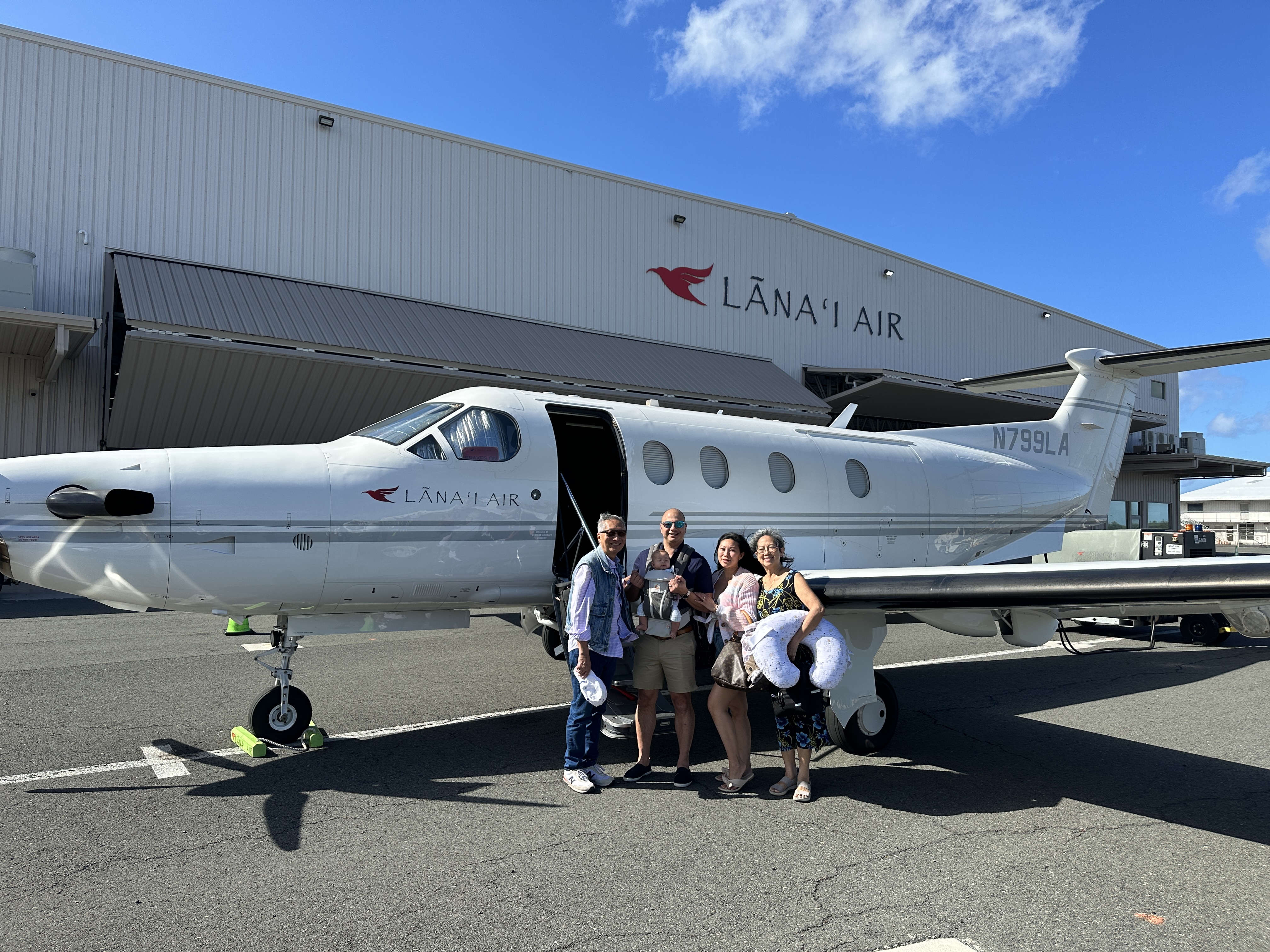 Posing for a picture outside the plane
