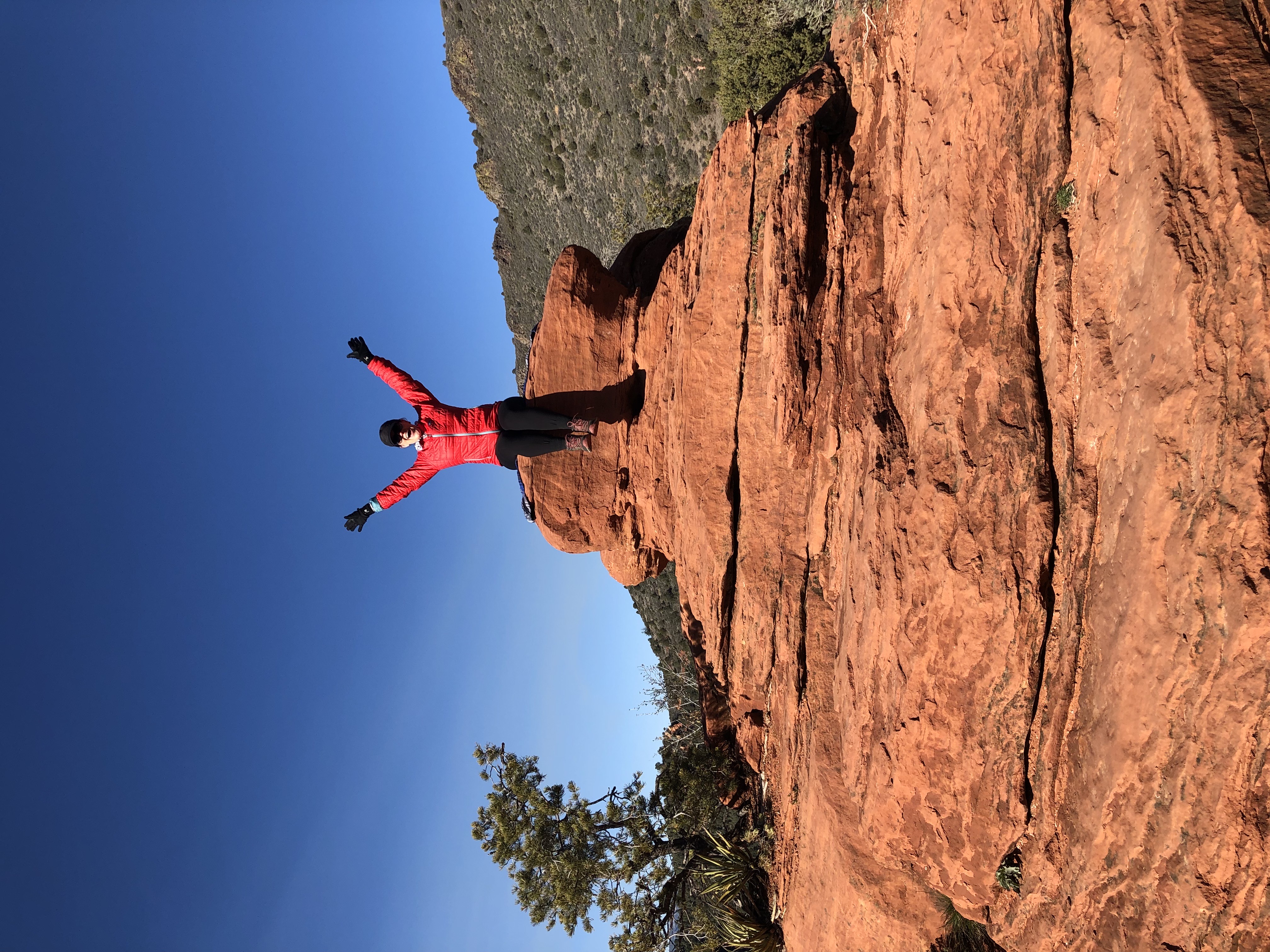 Picture of Hollie sitting on rock