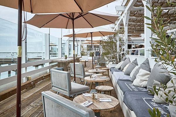 An outdoor seating area on a wooden deck