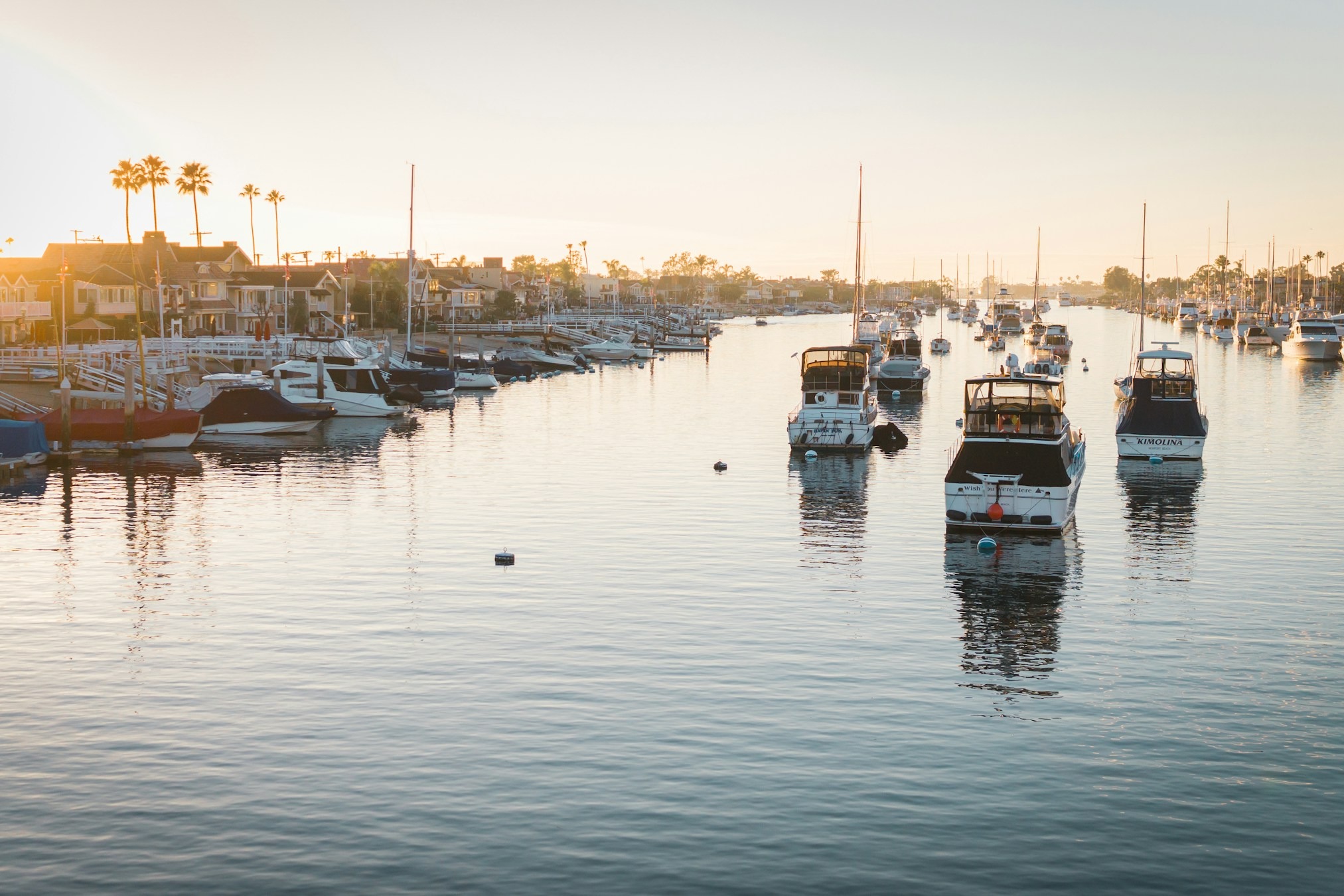 Boats on the water in a harbor during the daytime