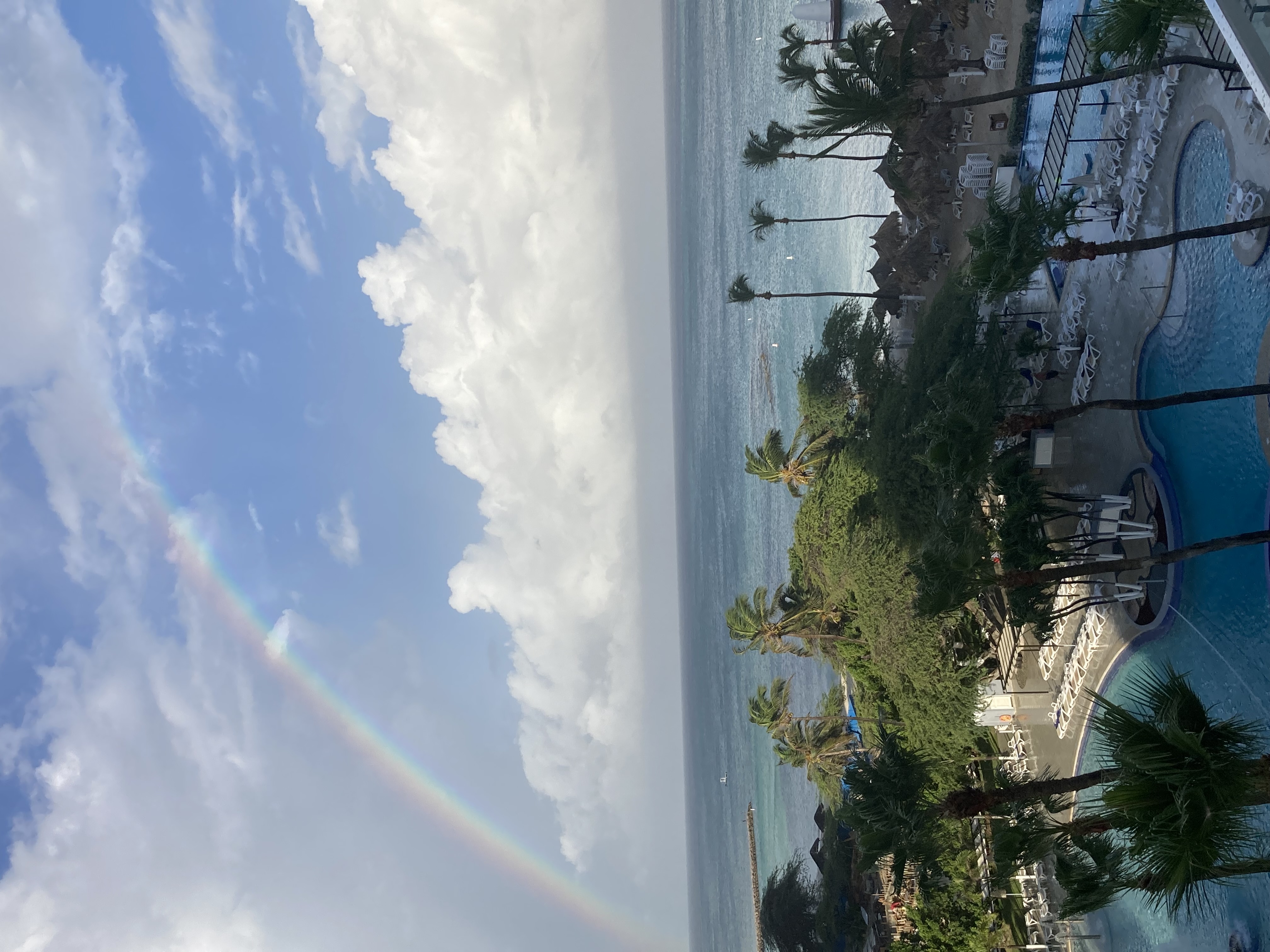 Beautiful of resort with rainbow in sky