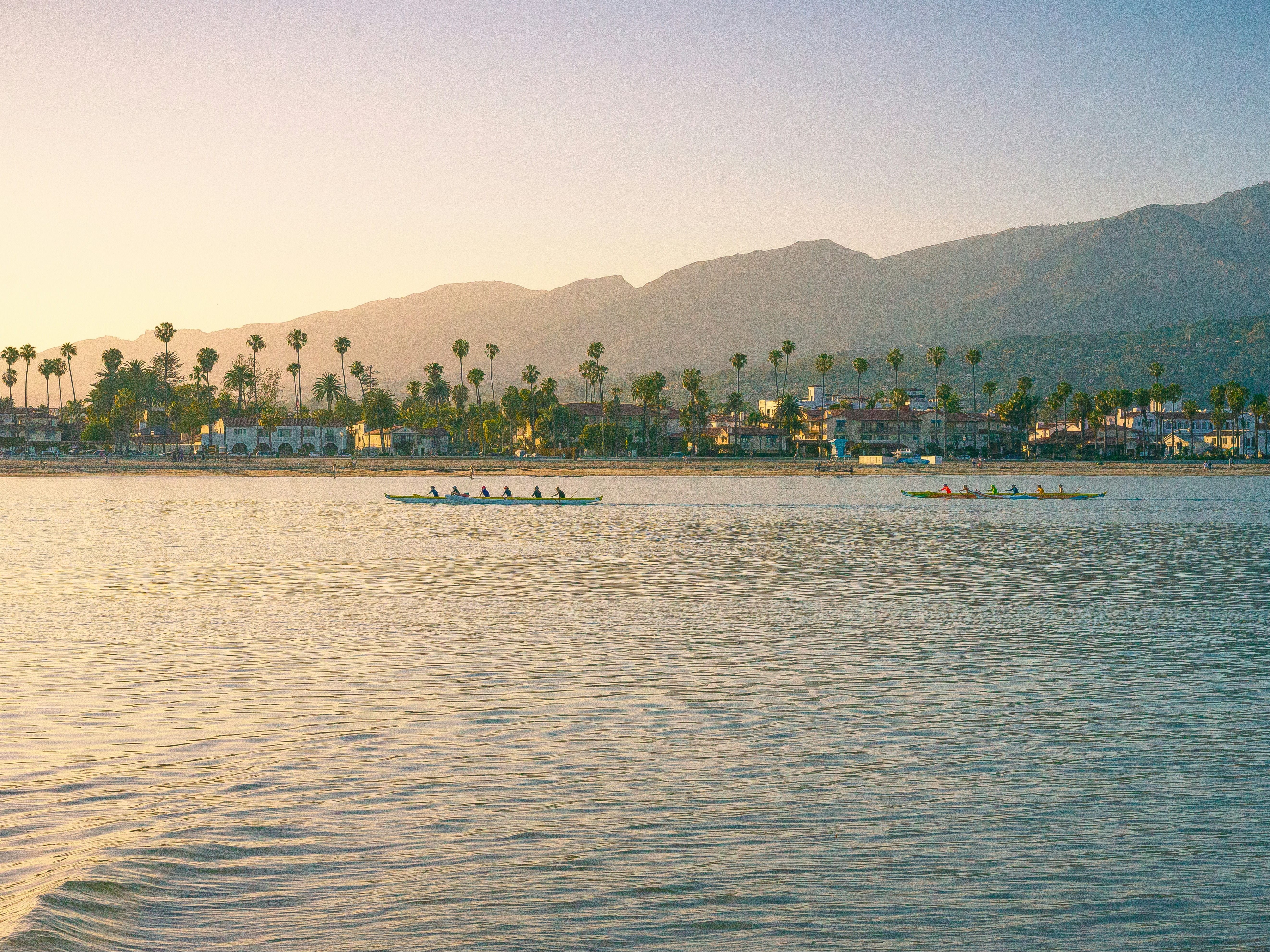 A picture of people riding boat on water during the daytime.