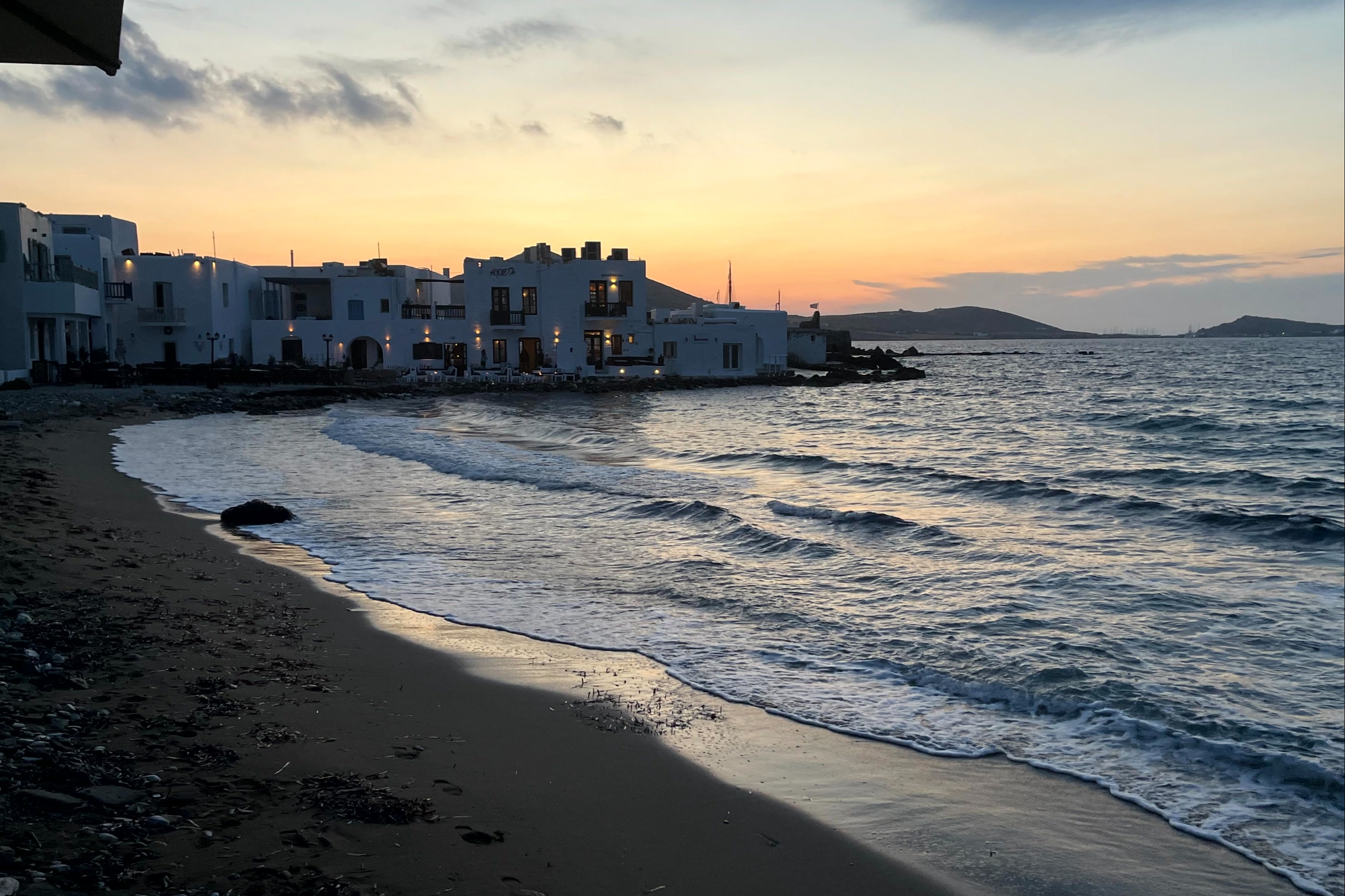 A picture of a sunset at a beach.
