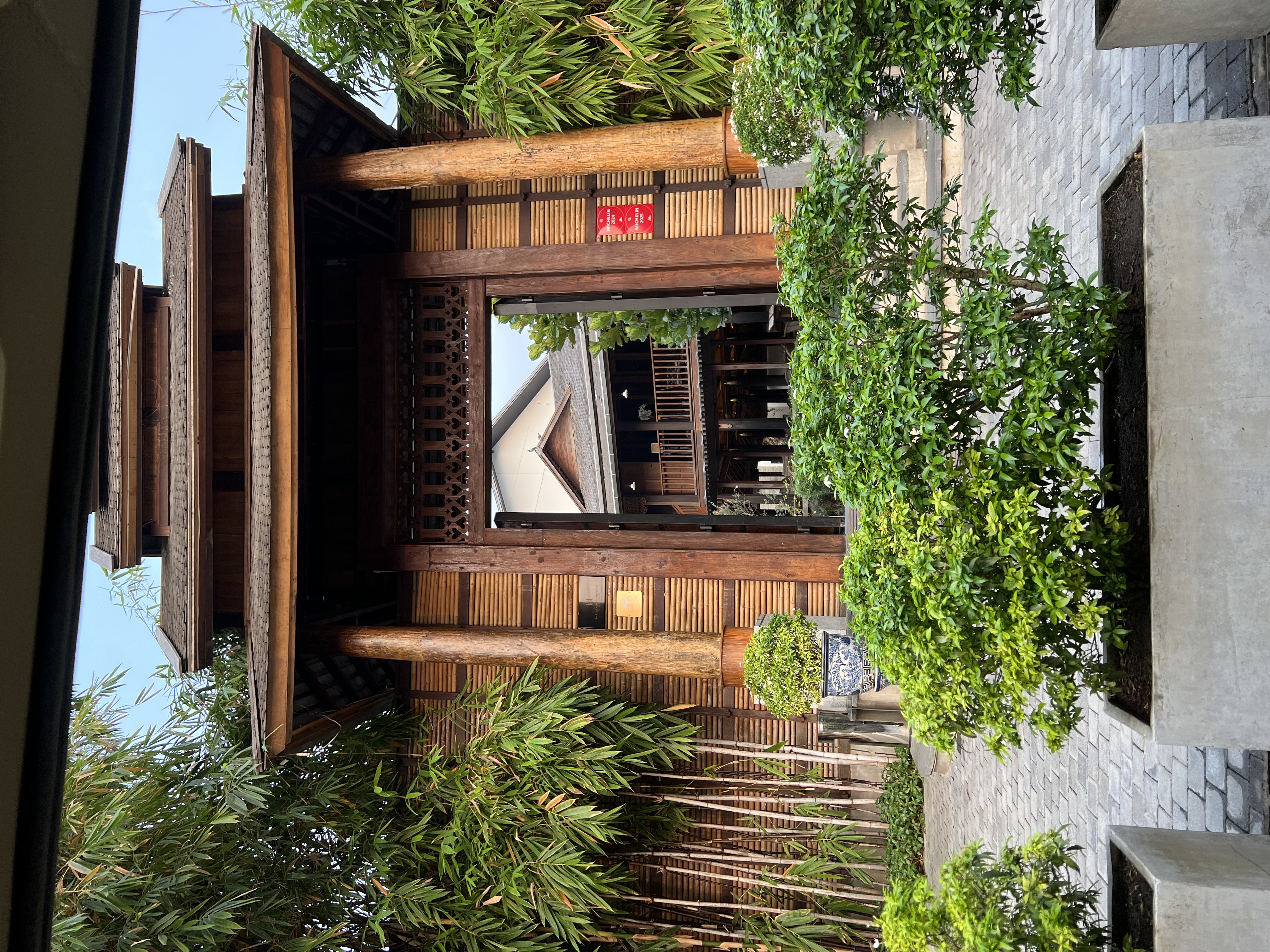 Traditional northern Thai architecture welcomes guests at Aleenta Retreat Chiang Mai.
